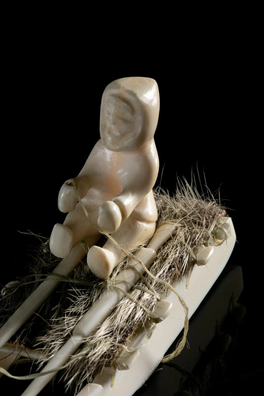 UNIDENTIFIED INUIT ARTIST, EASTERN CANADIAN ARCTIC, Hunter on Qamutiq (Sled) with Qimmiit (Sled Dogs), c. 1980