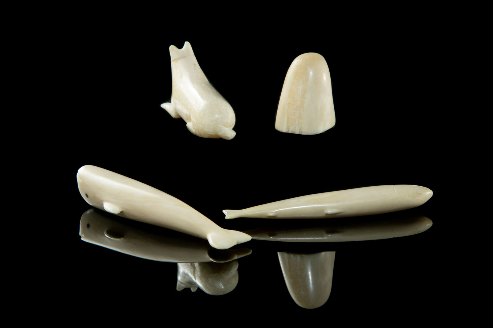 UNIDENTIFIED ARTISTS, possibly PANNIRTUQ (PANGNIRTUNG), Four Ivory Miniature Animals, early-mid 1960s