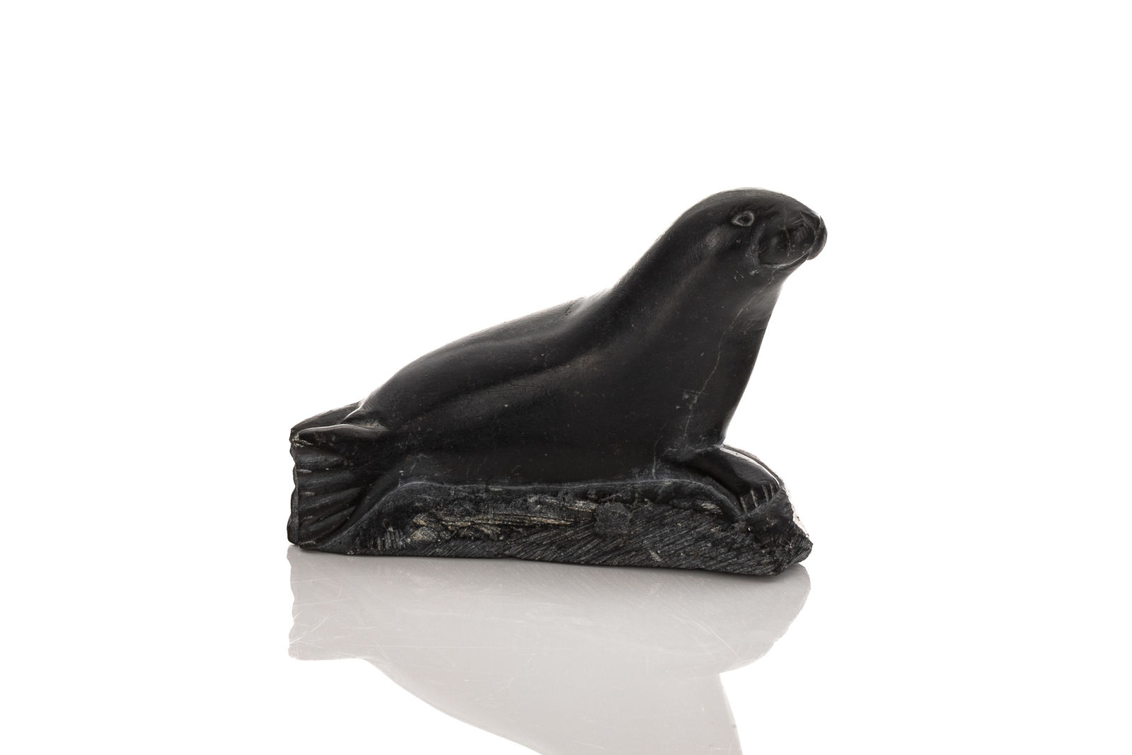 LUCASSIE ECHALOOK (1942-) INUKJUAK (PORT HARRISON), Lounging Seal, mid-late 1970s