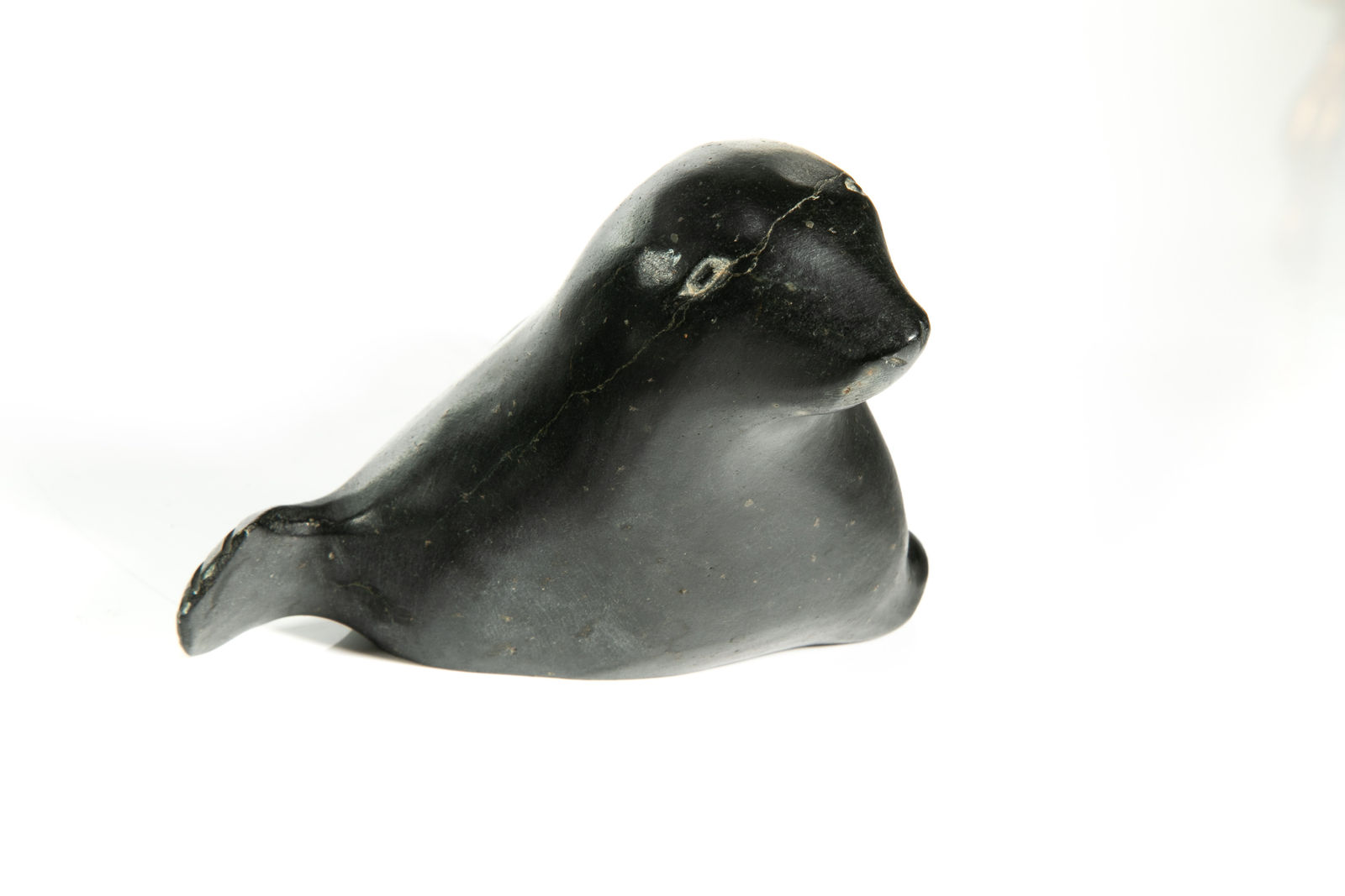 DAVID ARNASUNGAAQ (1964-) QAMANI'TUAQ (BAKER LAKE), Lounging Seal, c. 1990