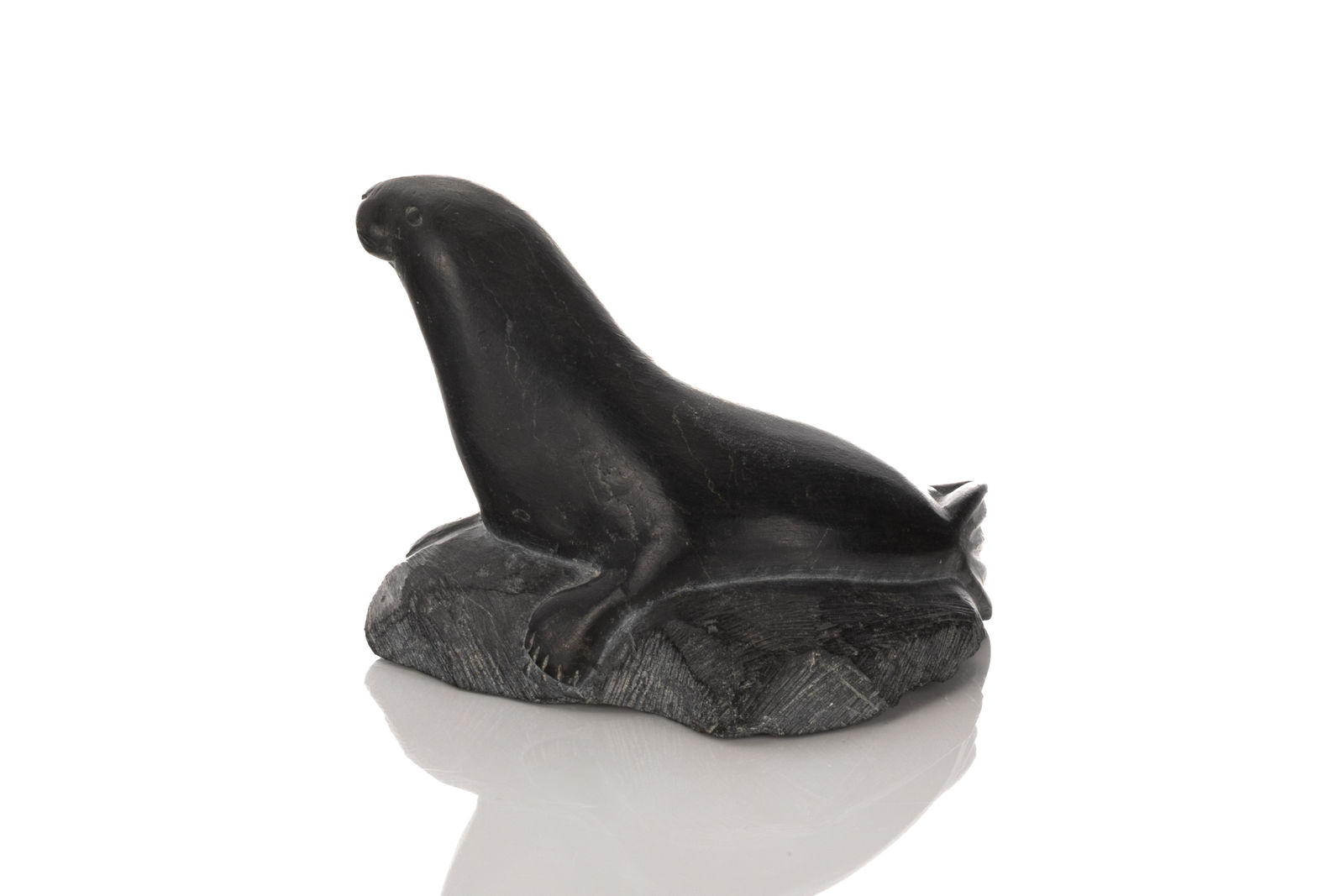 LUCASSIE ECHALOOK (1942-) INUKJUAK (PORT HARRISON), Lounging Seal, mid-late 1970s