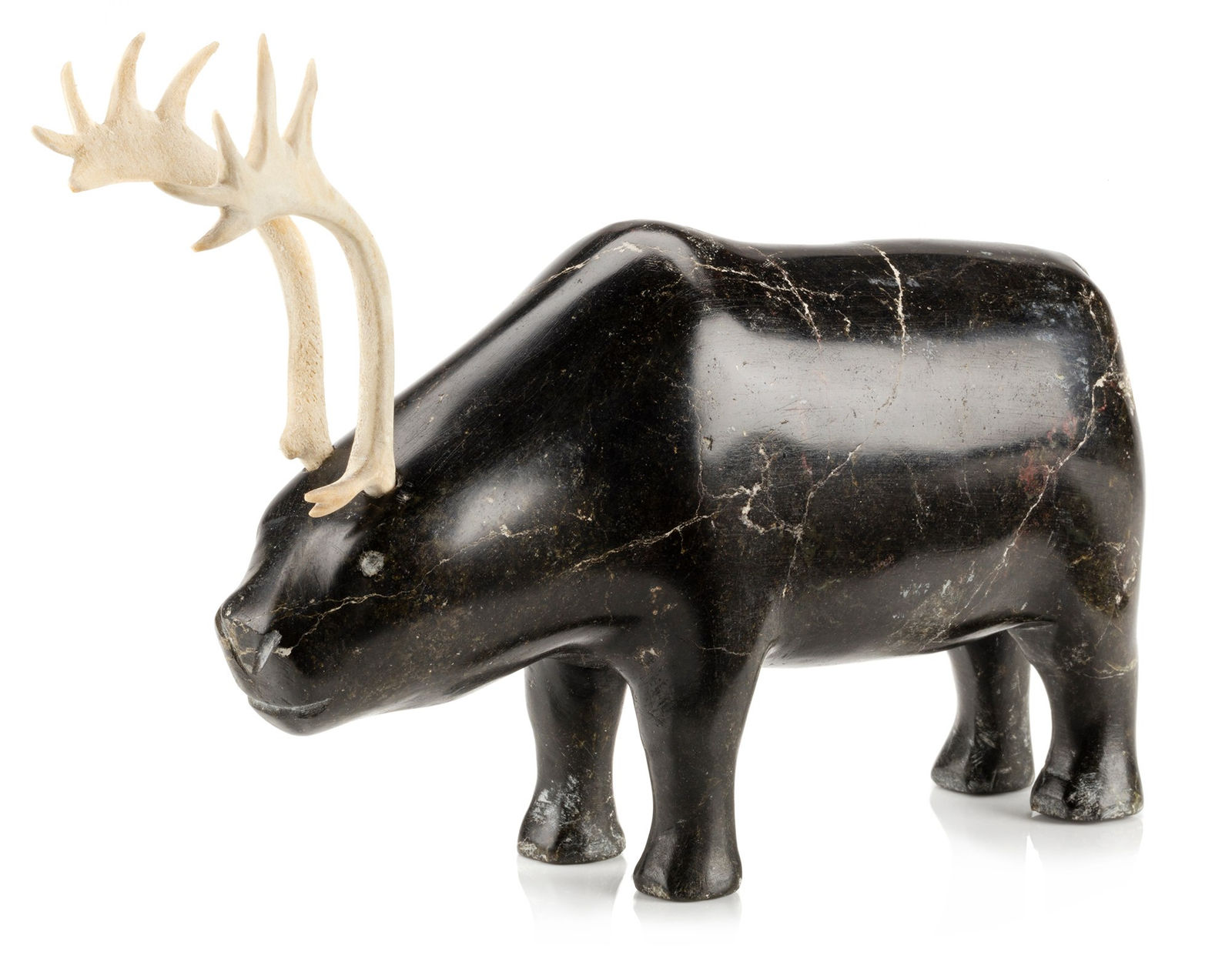 MARK TUNGILIK (1913-1986) NAUJAAT (REPULSE BAY), Standing Caribou, c. mid to late 1970s