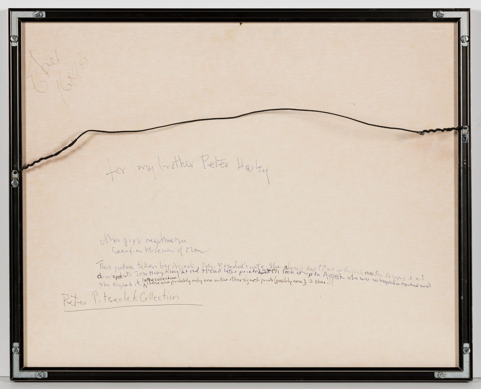 PETER PITSEOLAK (1902-1973) and AGGEOK PITSEOLAK (1906-1977) KINNGAIT (CAPE DORSET), Kooyoo Ottochie [daughter], Ashevak Ezekiel [son], Peter Pitseolak, and Pingwartok Ottochie [son?] Pulling a Bearded Seal from the Ice, 1944 (c. 1975?)