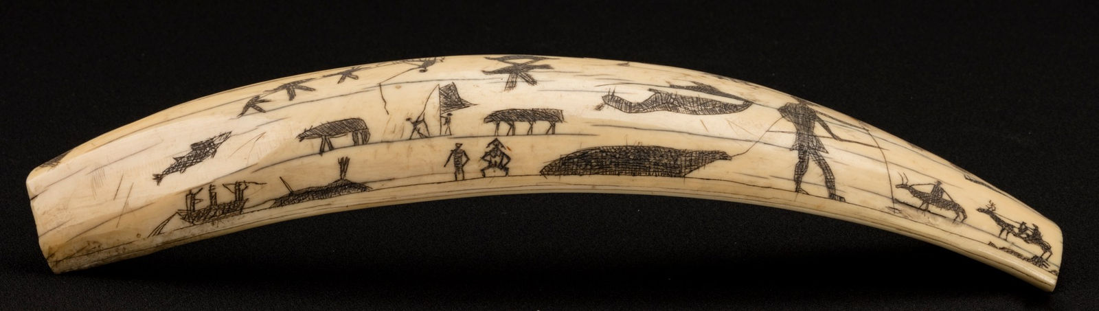 UNIDENTIFIED ARTIST, PROBABLY IÑUPIAQ, POSSIBLY SAINT MICHAEL AREA, ALASKA, Engraved Walrus Tusk, c. 1890s