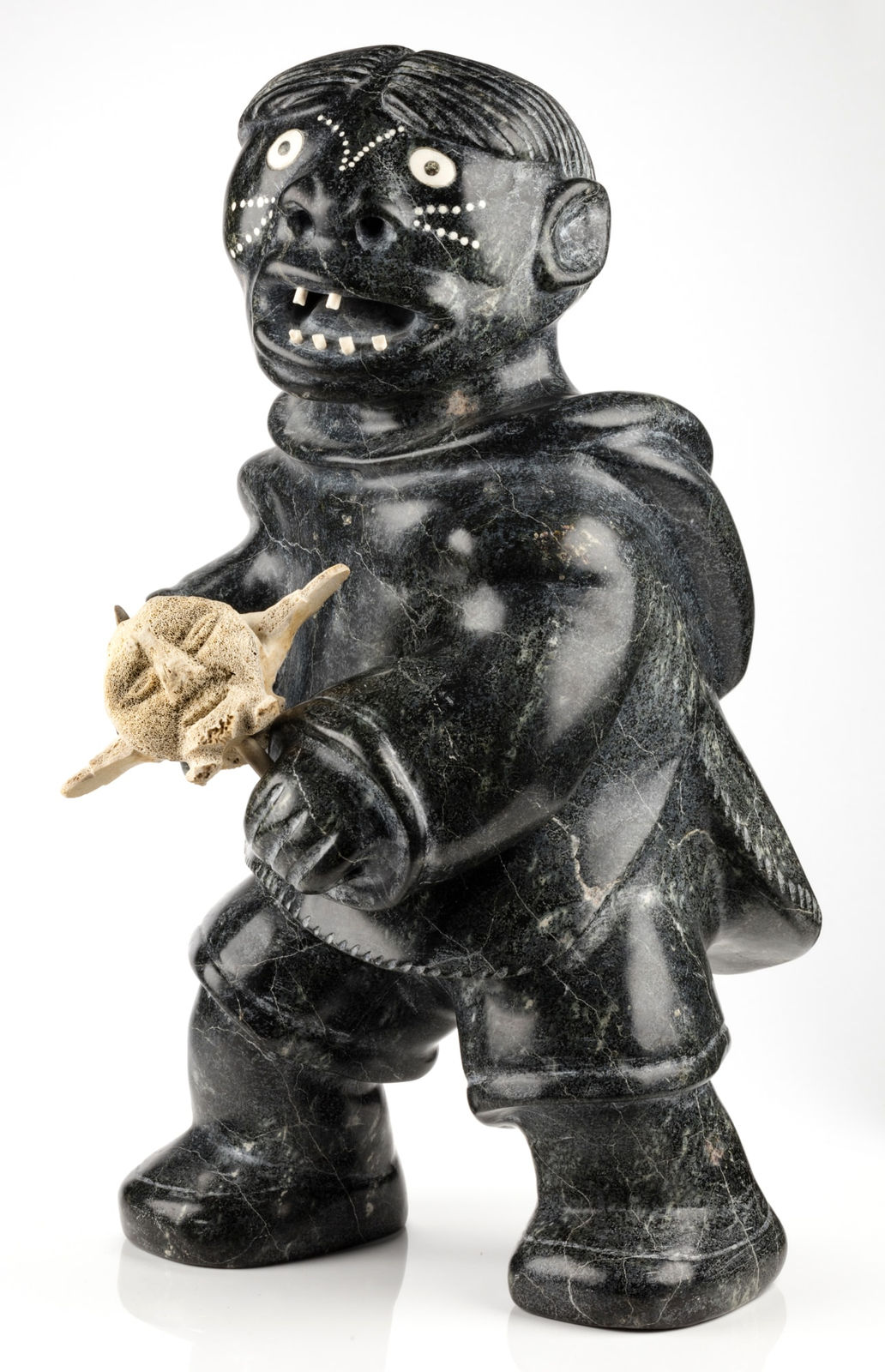 NELSON TAKKIRUQ (1930-) Uqsuqtuuq (Gjoa Haven), Tattooed Woman Holding Mask, 1988