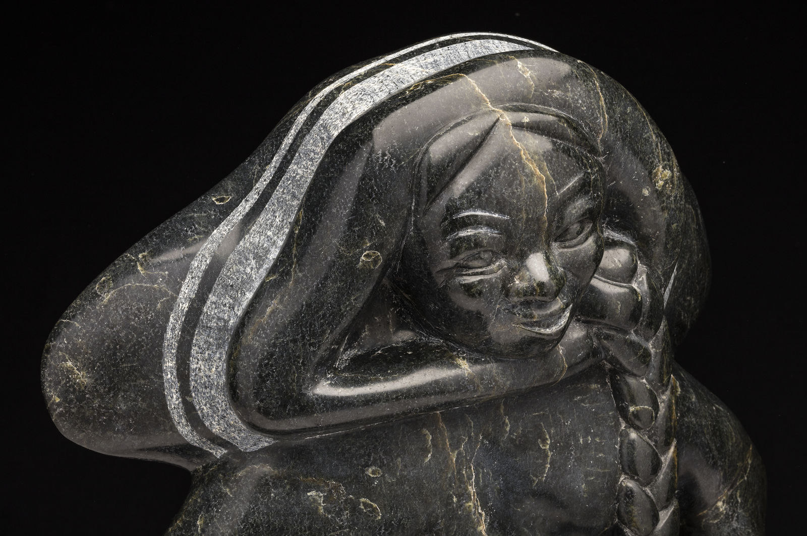 OSUITOK IPEELEE, R.C.A. (1922 or 1923-2005) KINNGAIT (CAPE DORSET, Young Woman Playing a Concertina, early 1980s