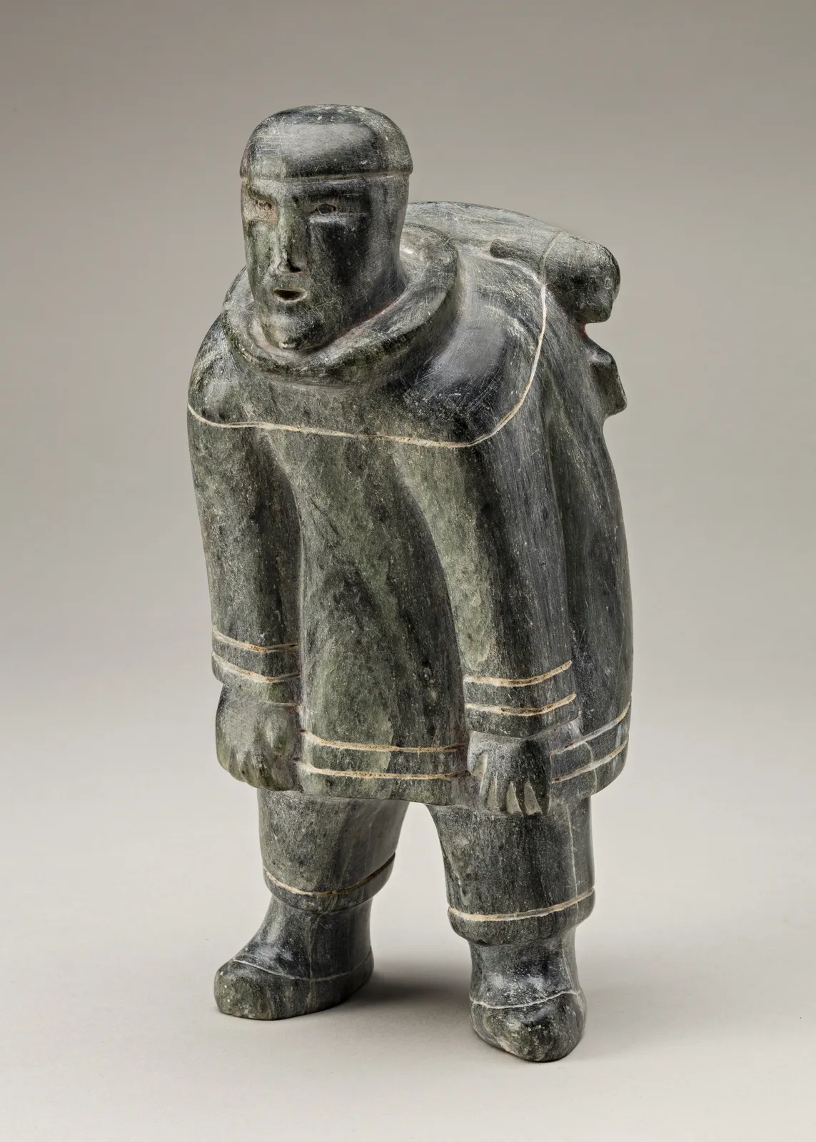 SOLOMONIE TIGULLARAQ (1924-2000) Kangiqtugaapik (Clyde River), Hunting Hauling Two Seals, c. 1966