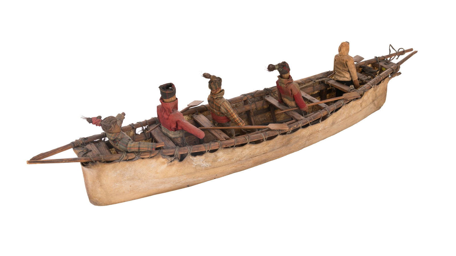 UNIDENTIFIED KALAALLIT (GREENLANDIC) ARTIST, Probably TUNU (EAST GREENLAND), Model Umiak Laden with Cargo and Figures, c. 1860