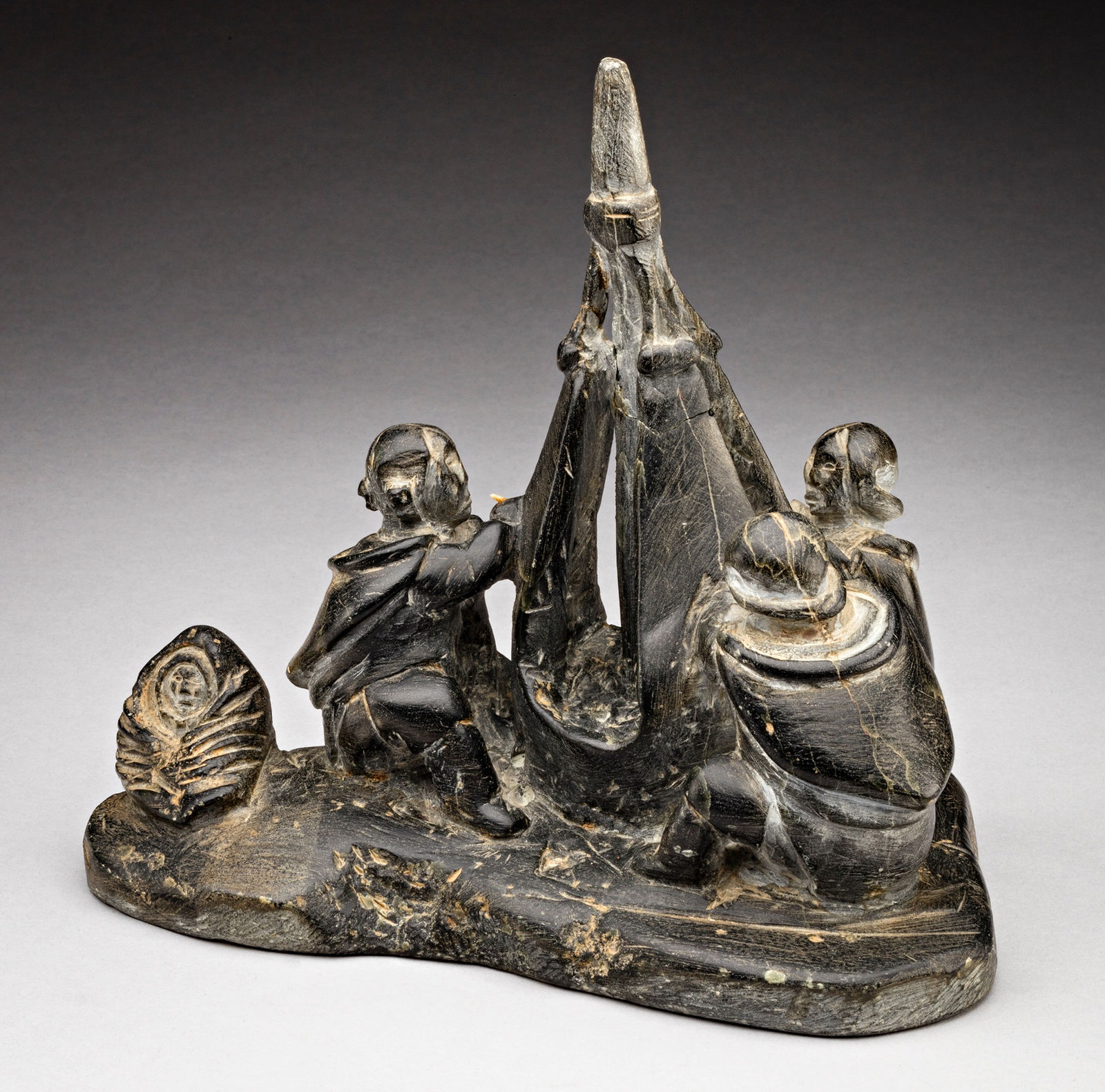 ENNUTSIAK (1893-1967) IQALUIT (FROBISHER BAY), Women Sewing Skins for a Kayak, c. 1958-60