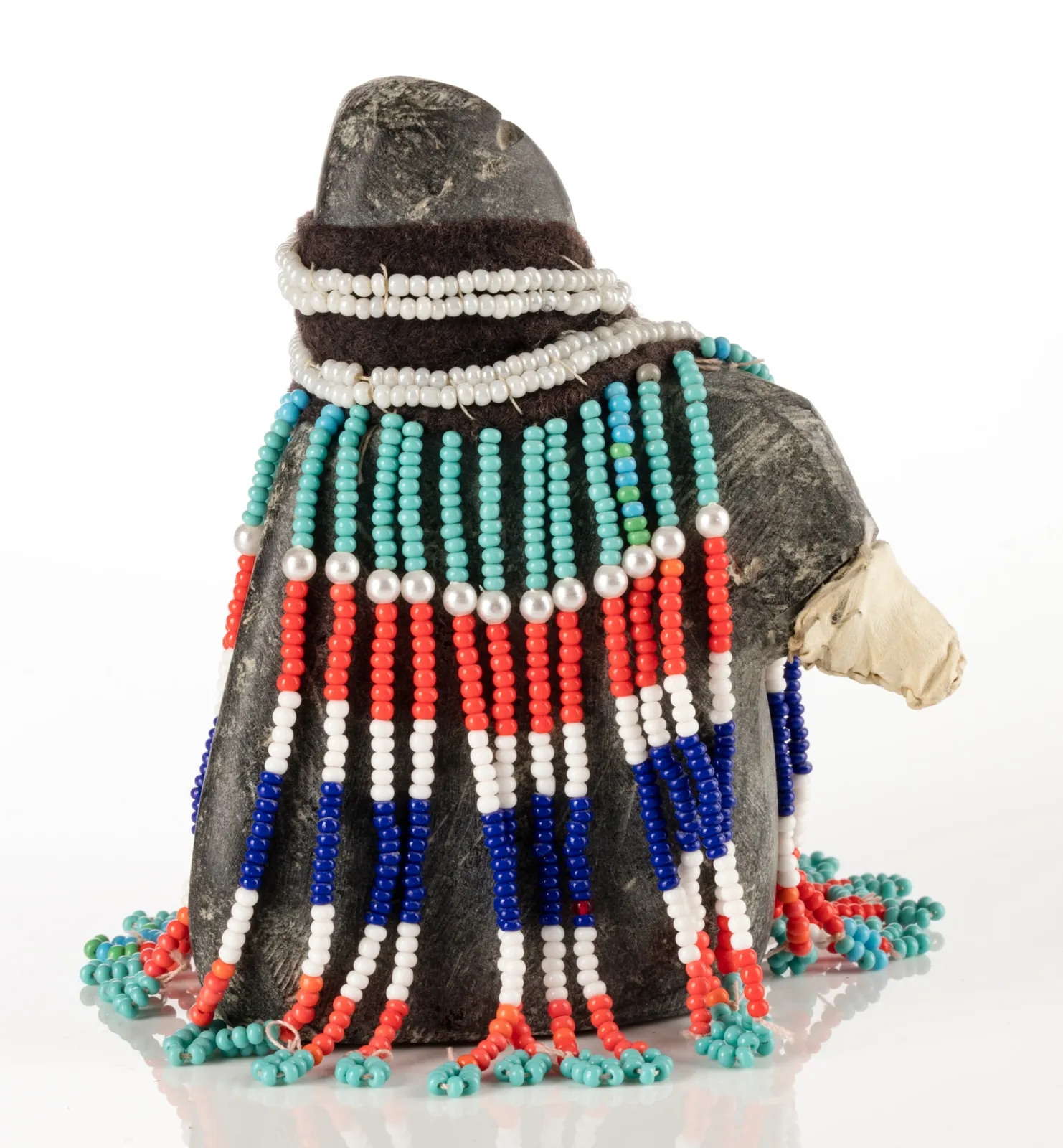 EVA TALOOKI ALIKTILUK (1927-1994) ARVIAT (ESKIMO POINT), Beaded Figure Wearing Mittens, c. 1980