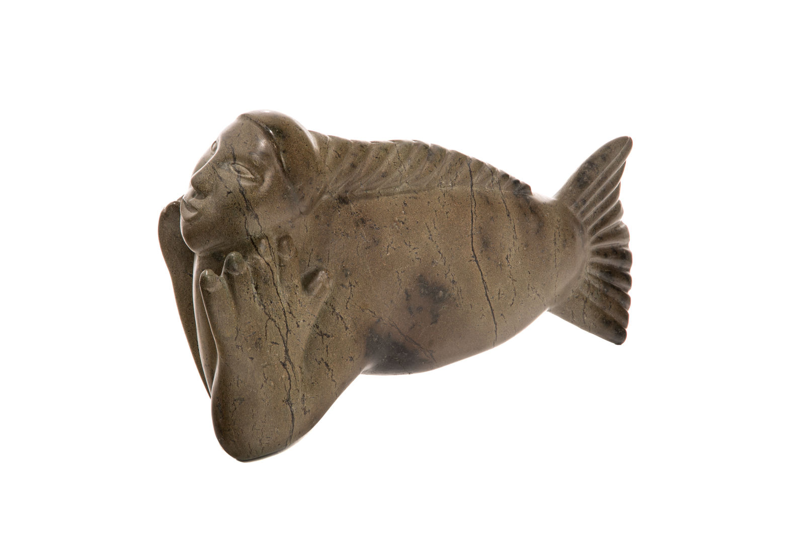 Attributed to: KENOJUAK ASHEVAK, C.C., R.C.A. (1927-2013) KINNGAIT (CAPE DORSET), Swimming Sedna with Plaited Hair, early-mid 1970s