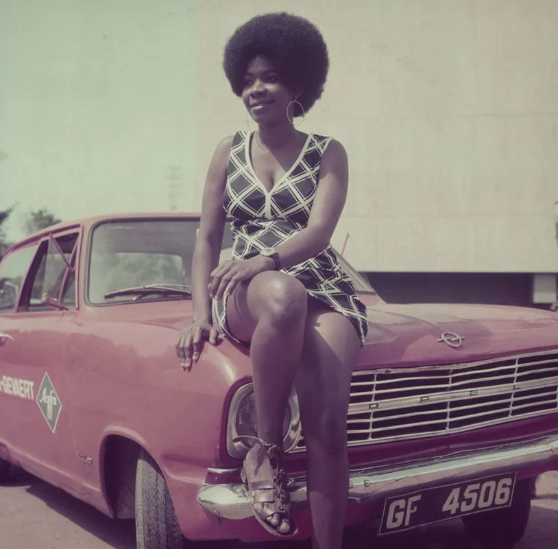James Barnor, Woman posing on James Barnor's car, Accra, 1970s