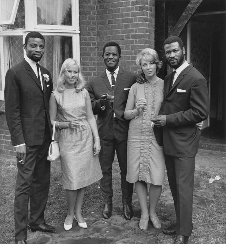 James Barnor, Friends pose for the camera after the wedding of Mrs and Mr Sackey in Balham, 1966