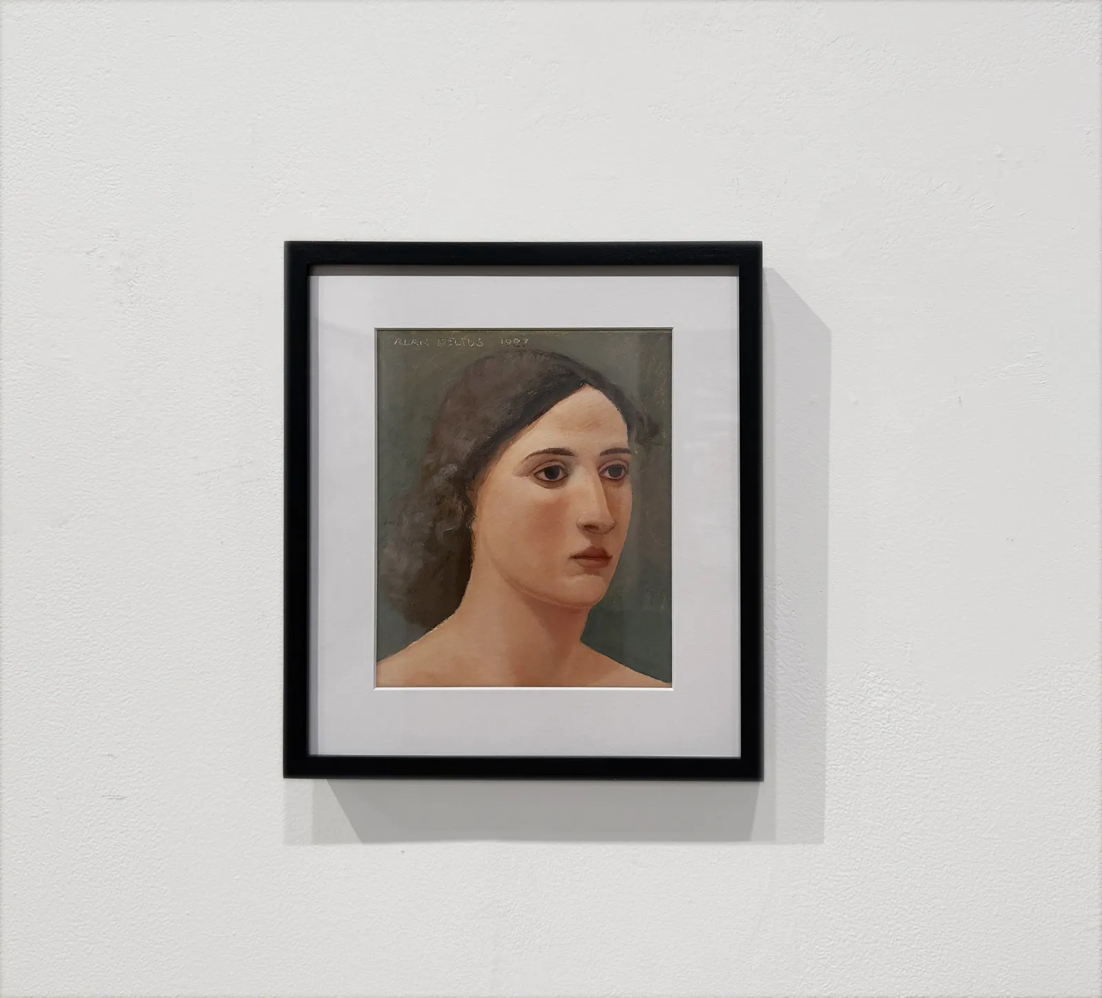 Female head portrait with dark hair and light skin