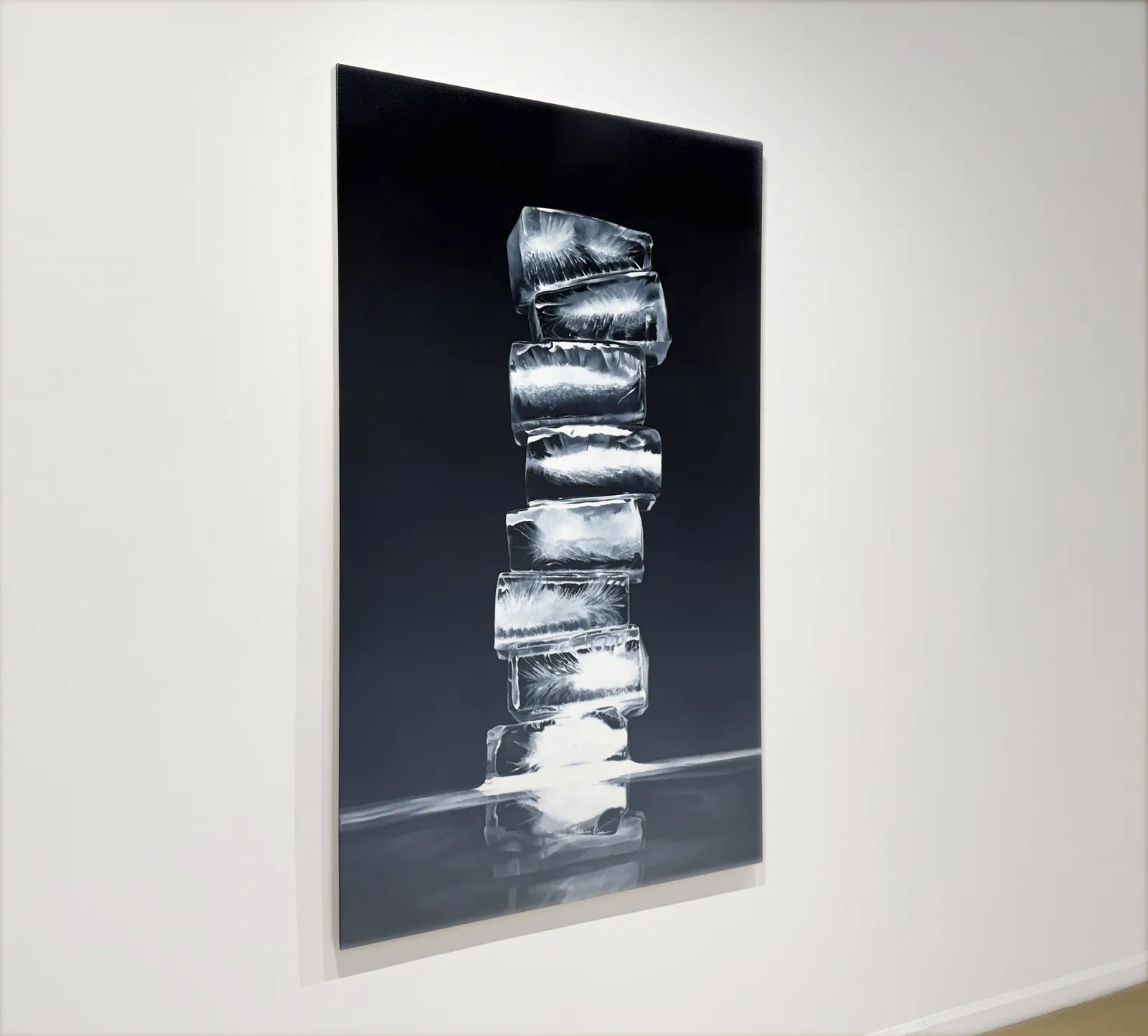 Painting of ice cubes in front of a black background