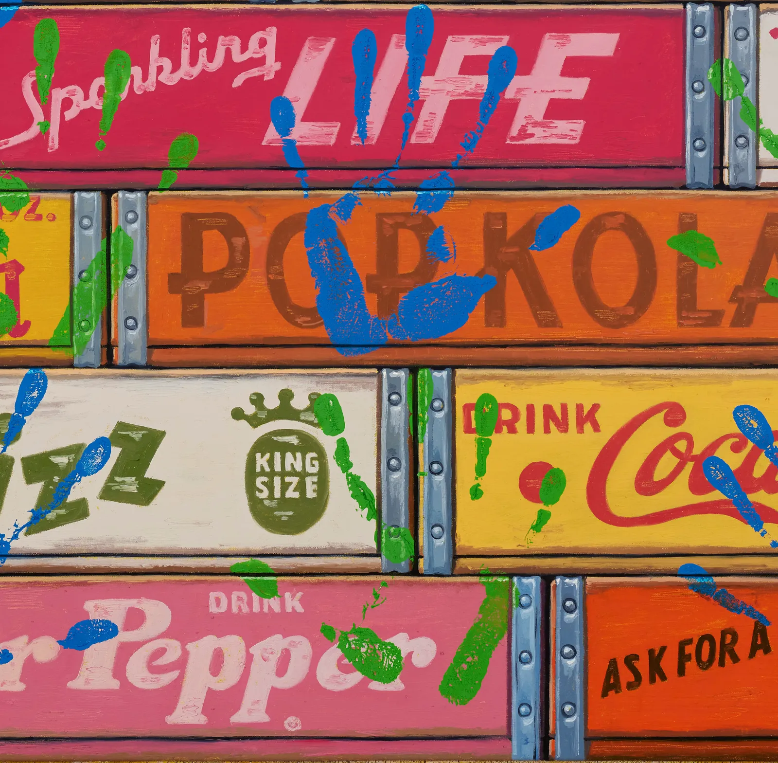 Detail of boxes with green and blue hand prints