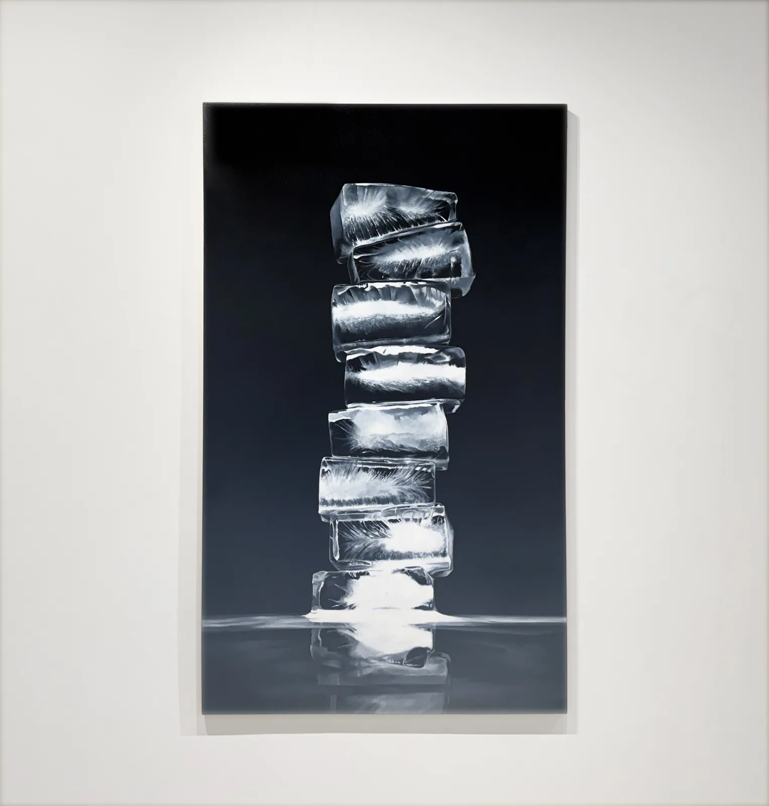 Painting of ice cubes in front of a black background