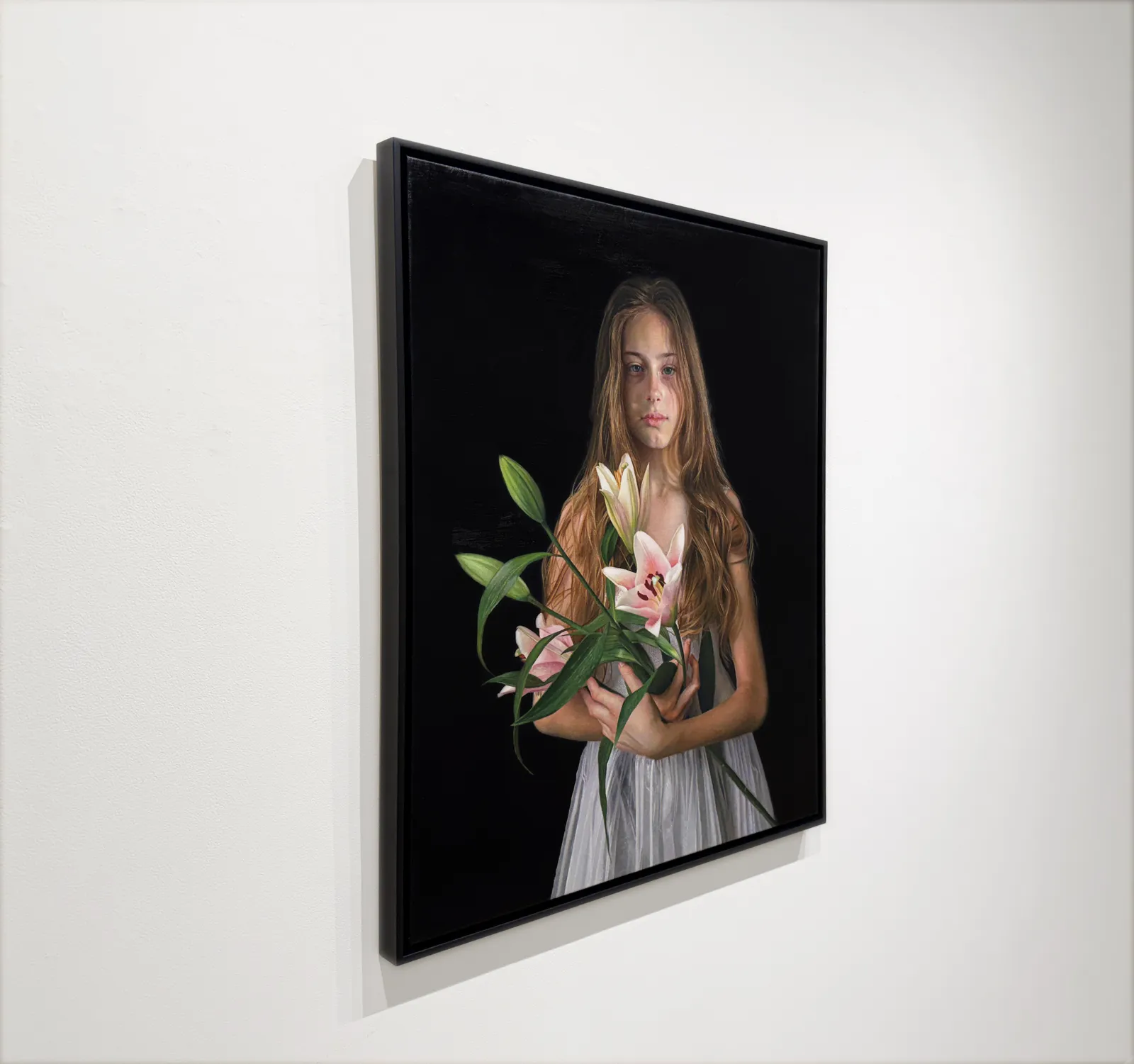 Portrait of a girl holding flowers