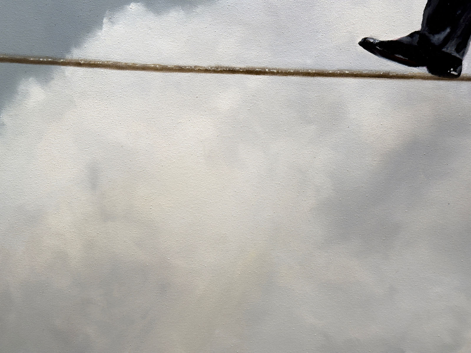 Man in business suit walking on a tightwire