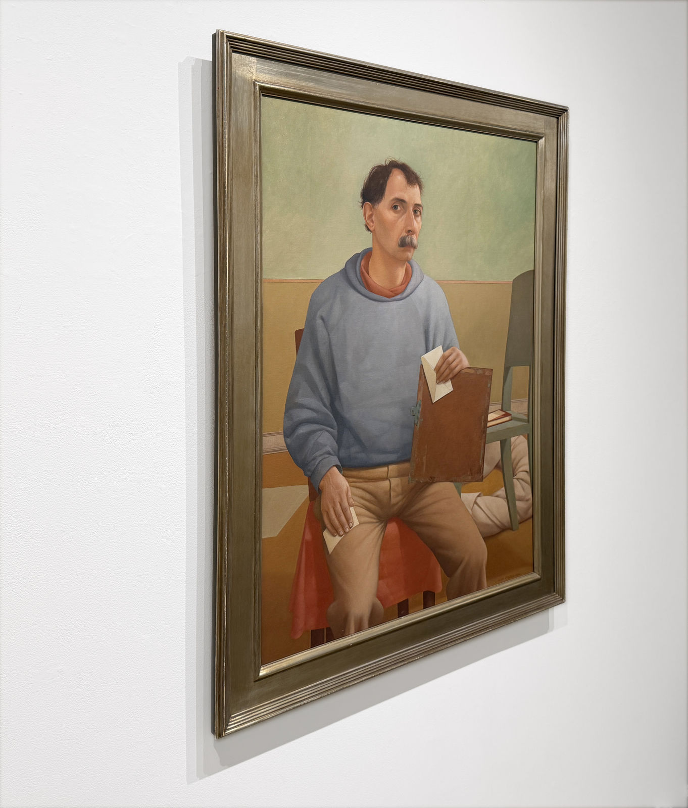 Self portrait painting with blue shirt