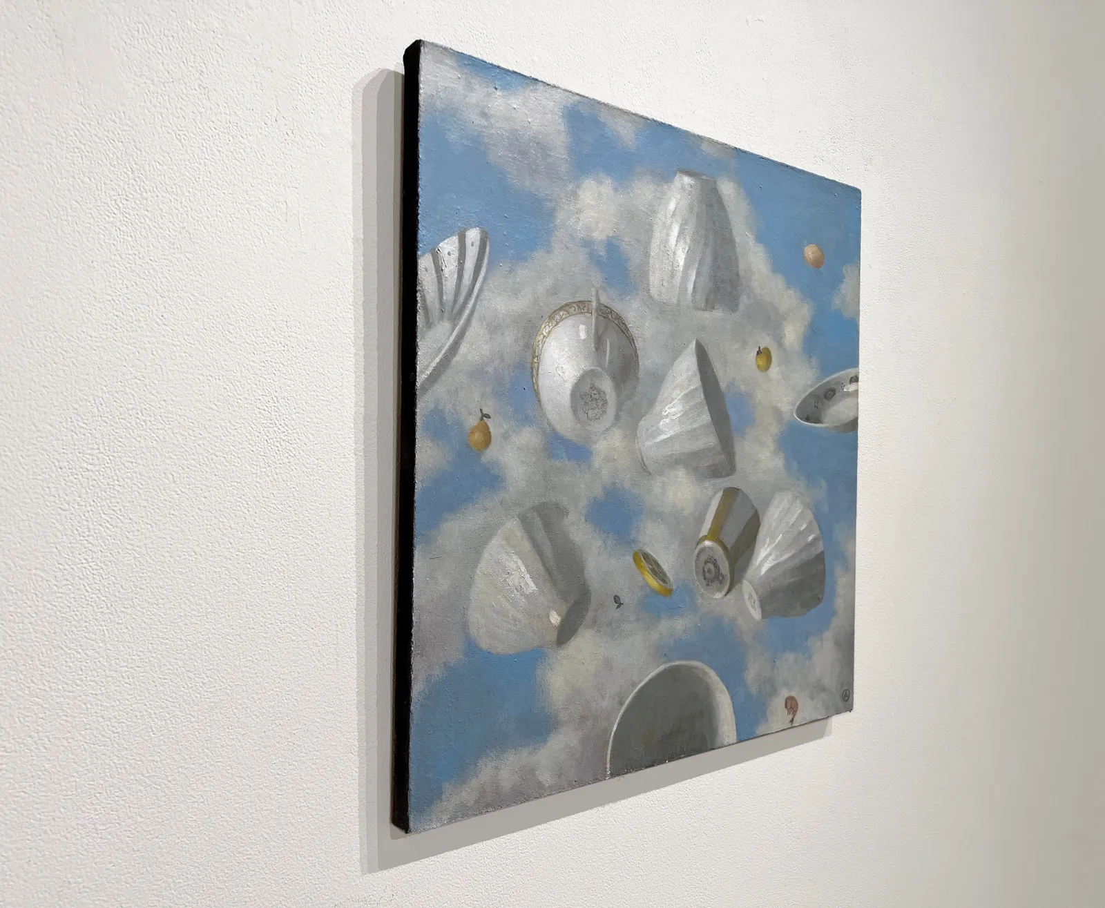 Olga Antonova FLYING STILL LIFE, 2022 Oil on Canvas 22 x 22 in. 55.9 x 55.9 cm. (OA-740) - Teacups depicted floating in a sky full of clouds.
