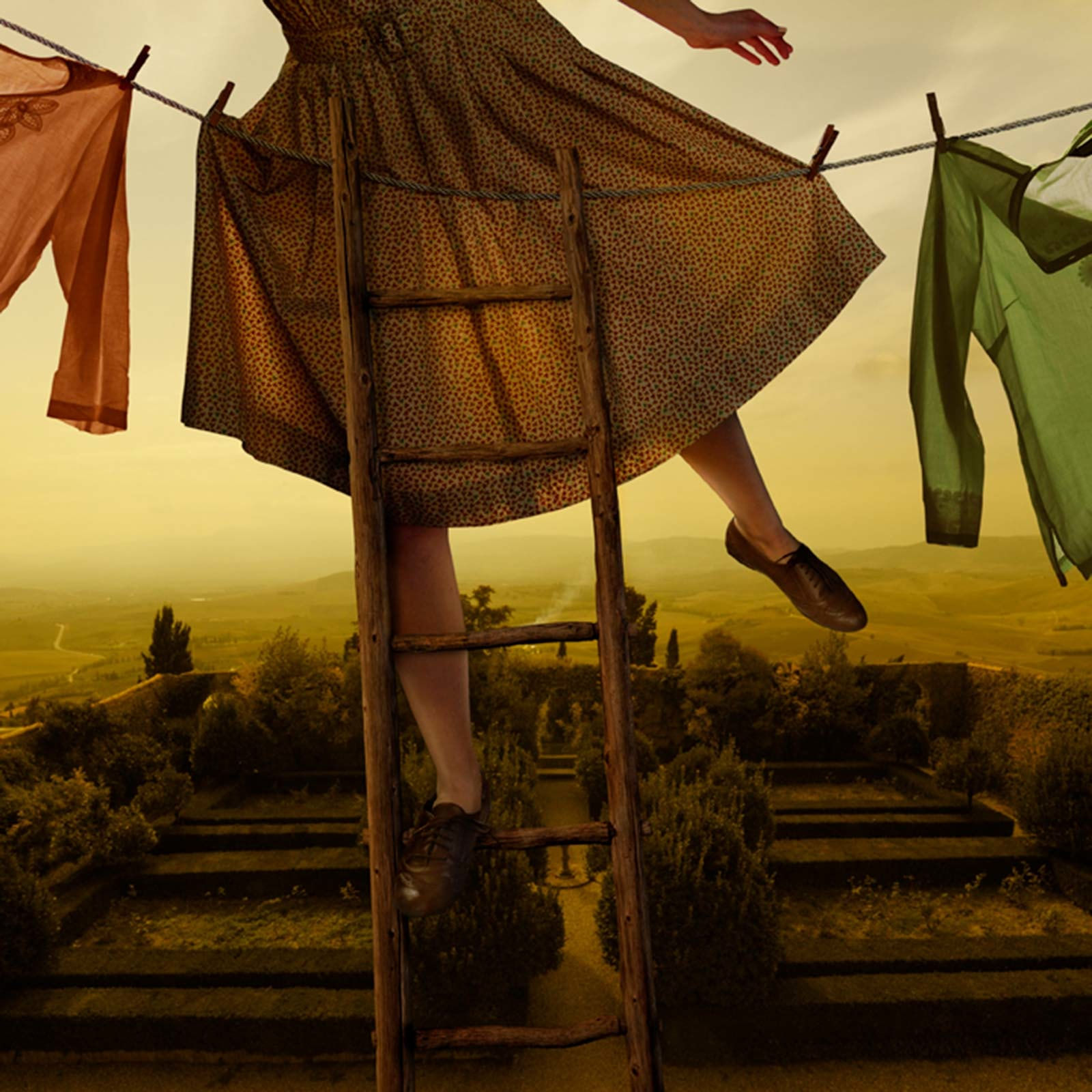 Tom Chambers photograph laundry hanging Italy pennants over Pienza buy here Gilman Contemporary Sun Valley art gallery