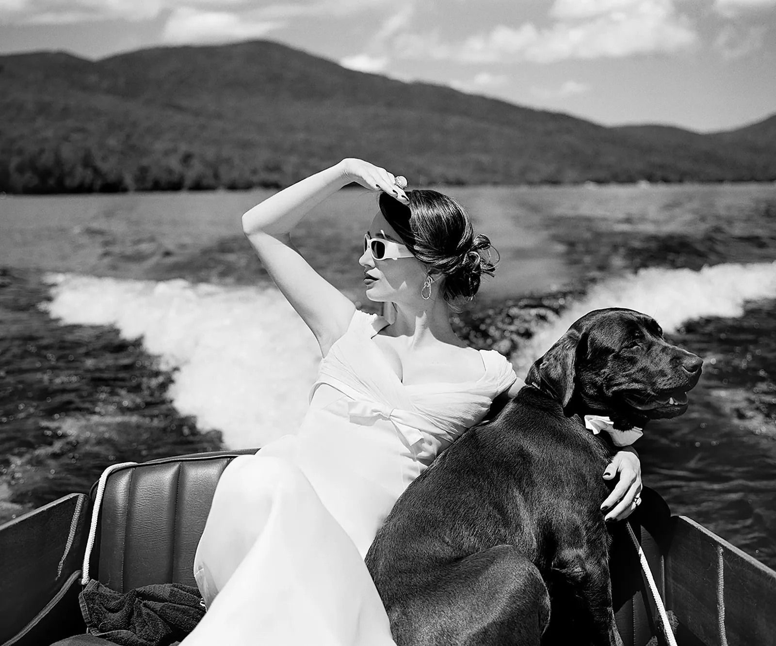 Rodney Smith photography Lake Placid, New York woman in boat with black lab Gilman Contemporary sun valley art gallery