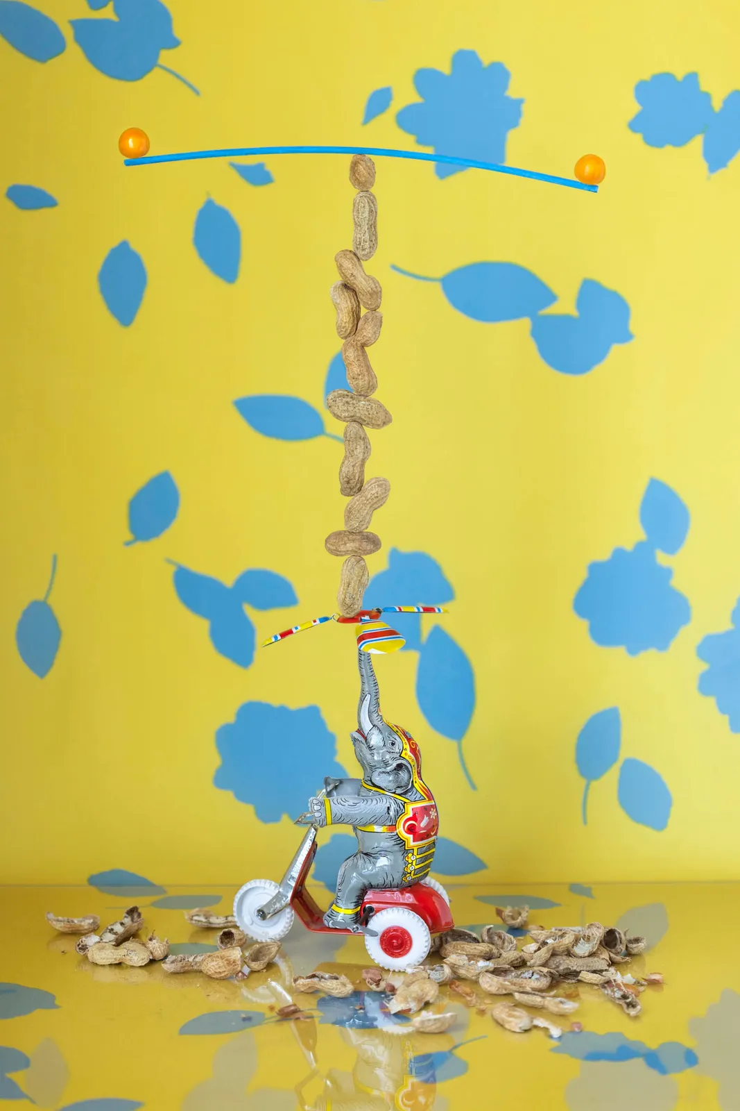 jp terlizzi picture of elephant toy holding stacked peanuts