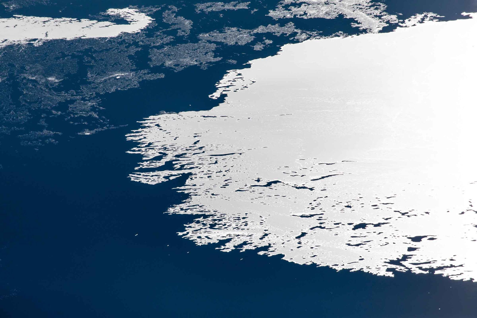 Frozen Lake photography by Jackson Hole artist Tuck Fauntleroy at Gilman Contemporary Sun Valley art gallery Idaho