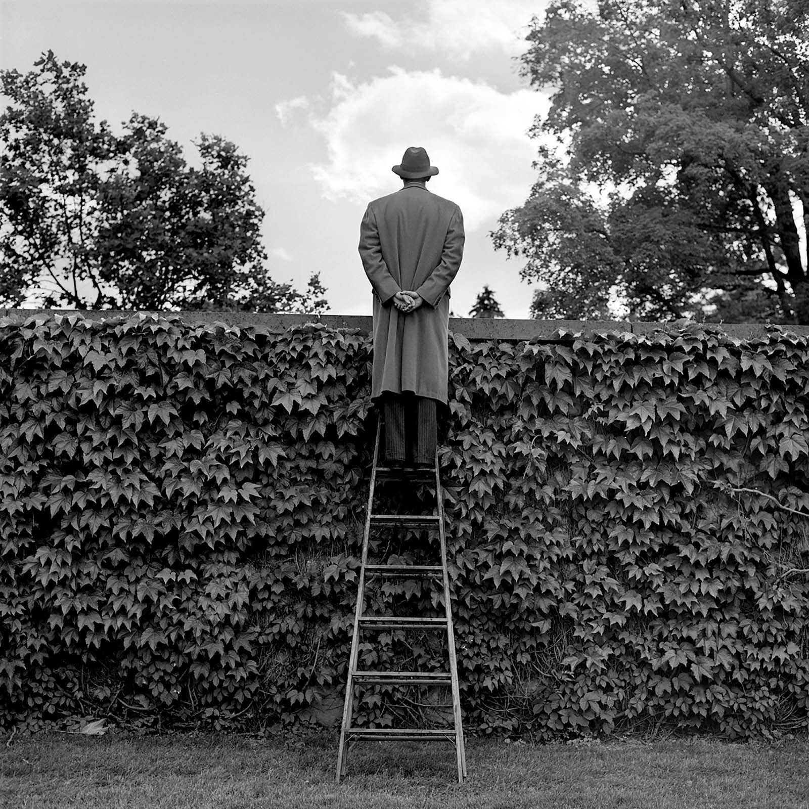 buy here Gilman Contemporary Rodney Smith man looking over ivy wall New York Sun Valley art gallery