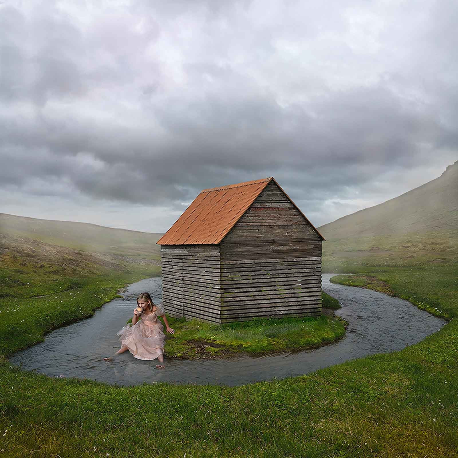 Tom Chambers photograph moody scene girl in rain by river buy here Sun Valley art gallery Gilman Contemporary Idaho