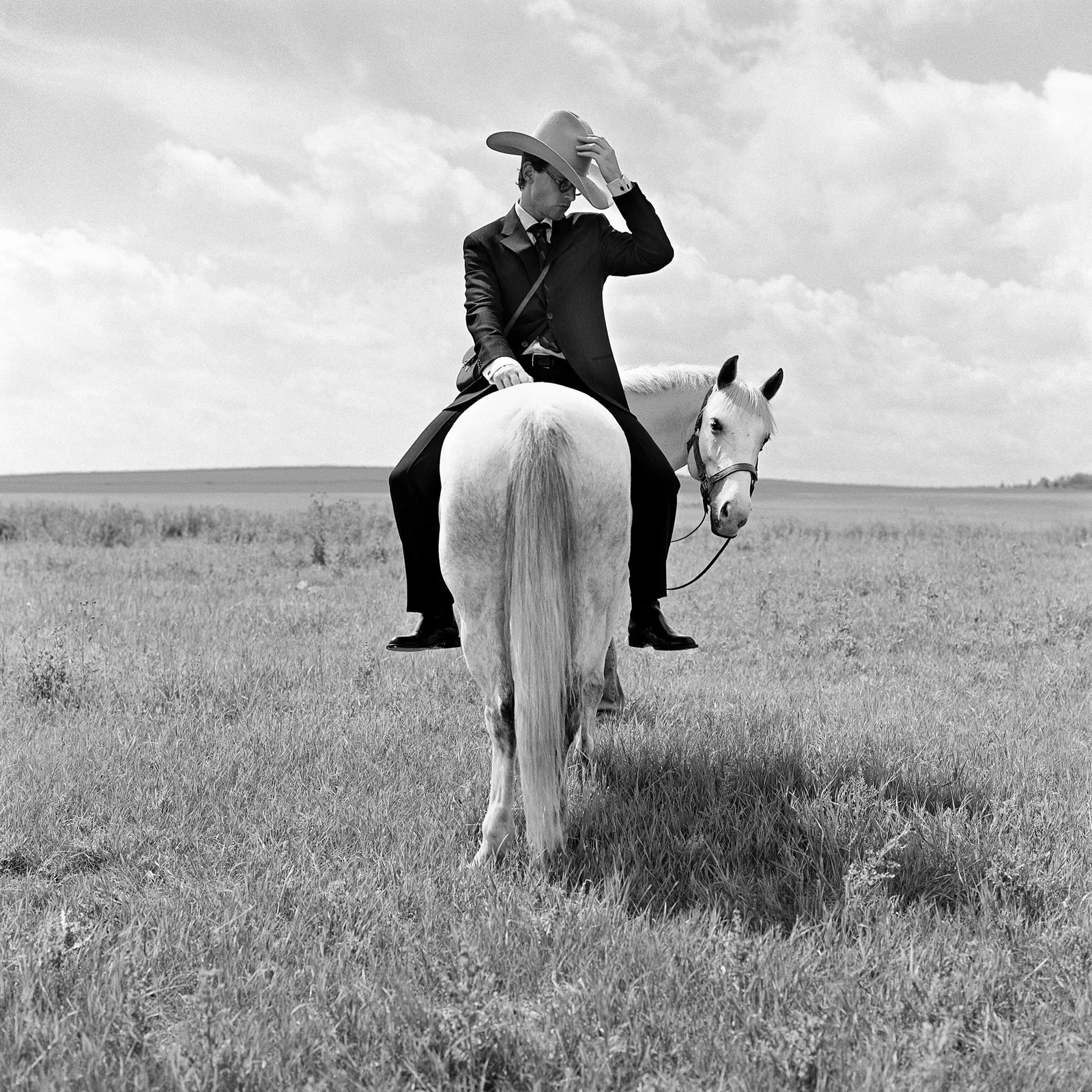 Rodney Smith photography buy here Gilman Contemporary Sun Valley art gallery man o horse backwards Alberta, CA