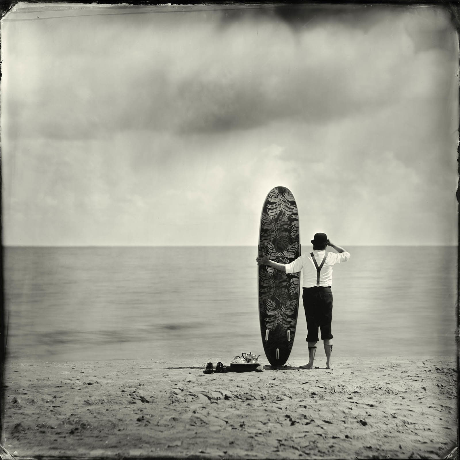 Alex Timmermans photography man with surfboard buy here Gilman Contemporary Sun valley art gallery