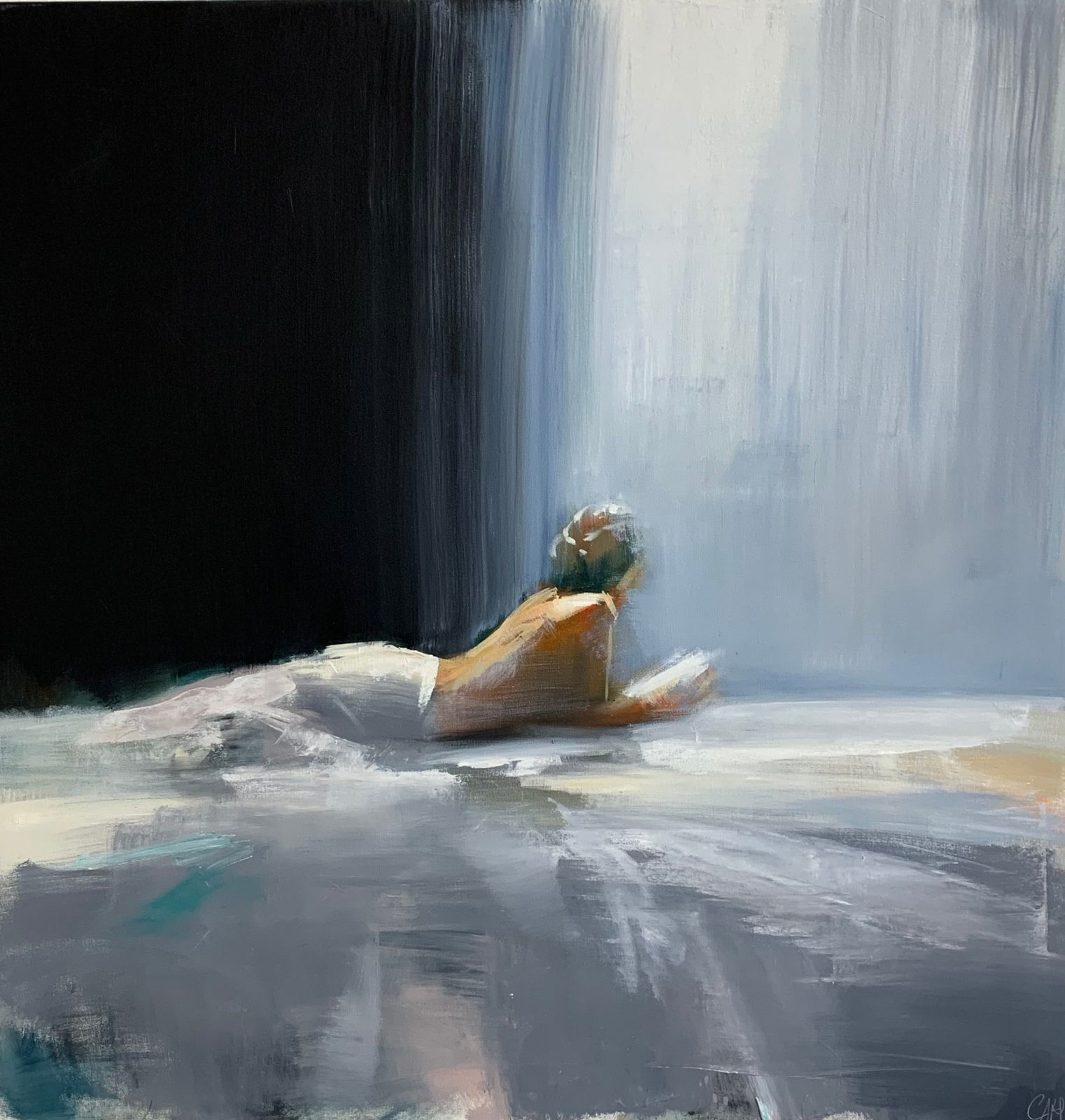 portrait of woman reading on a bed by craig mooney