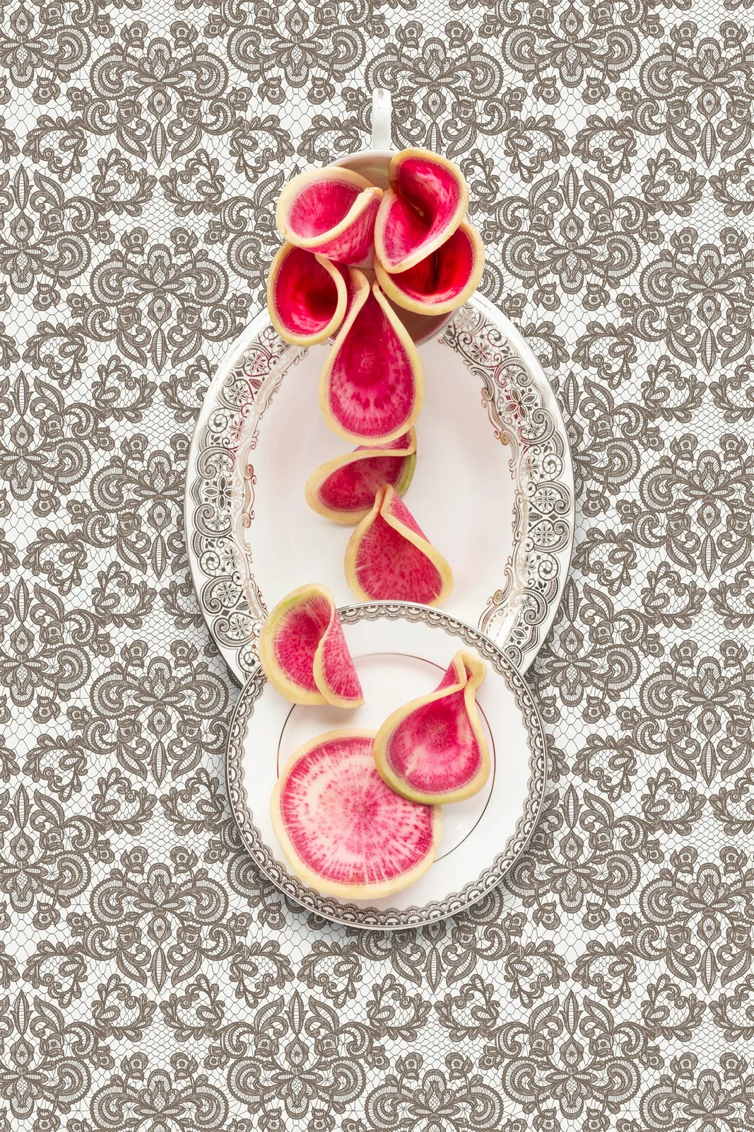 watermelon radish slices designed on waterford lismore lace plates