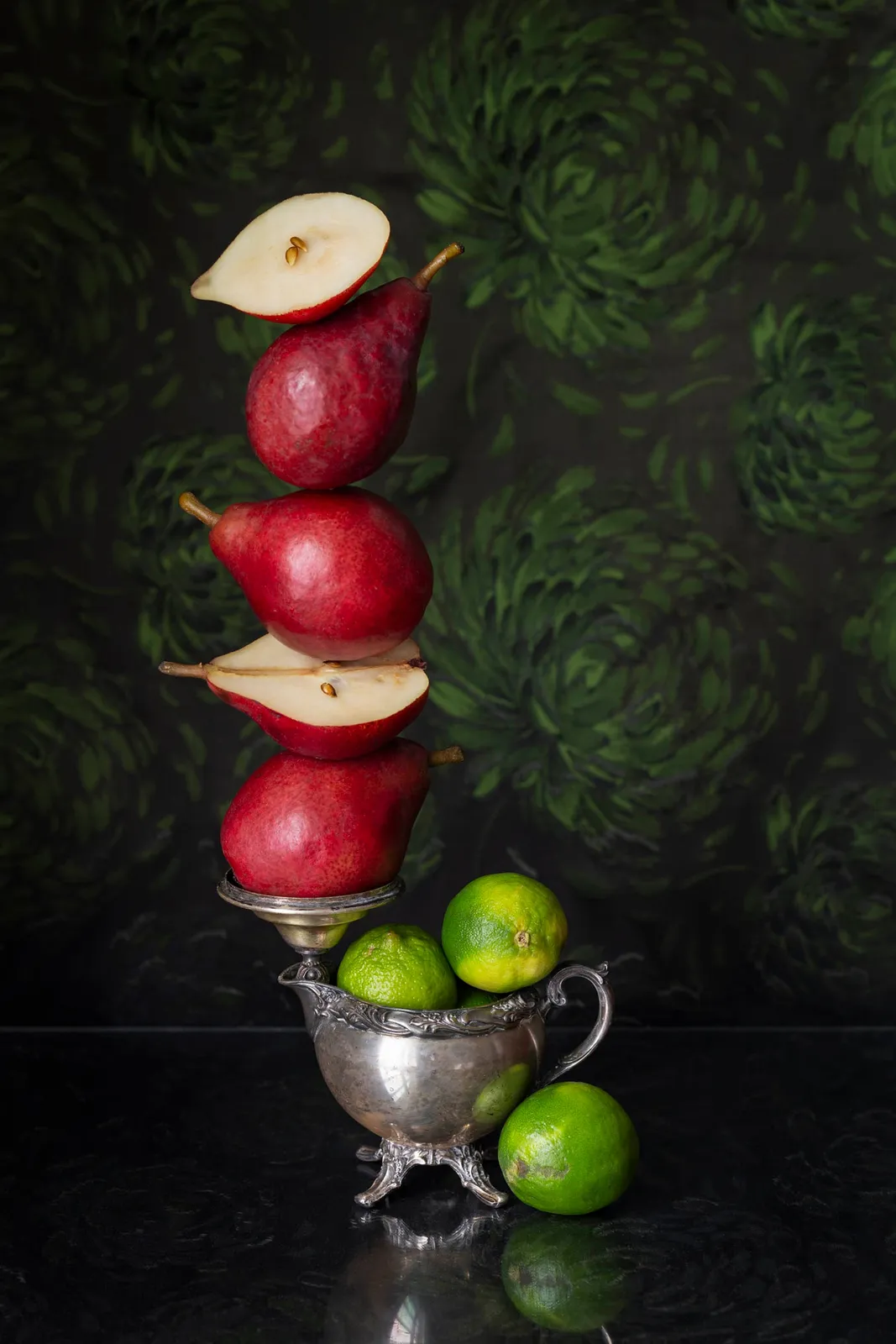 stacked pears on silver dish photo by jp terlizzi