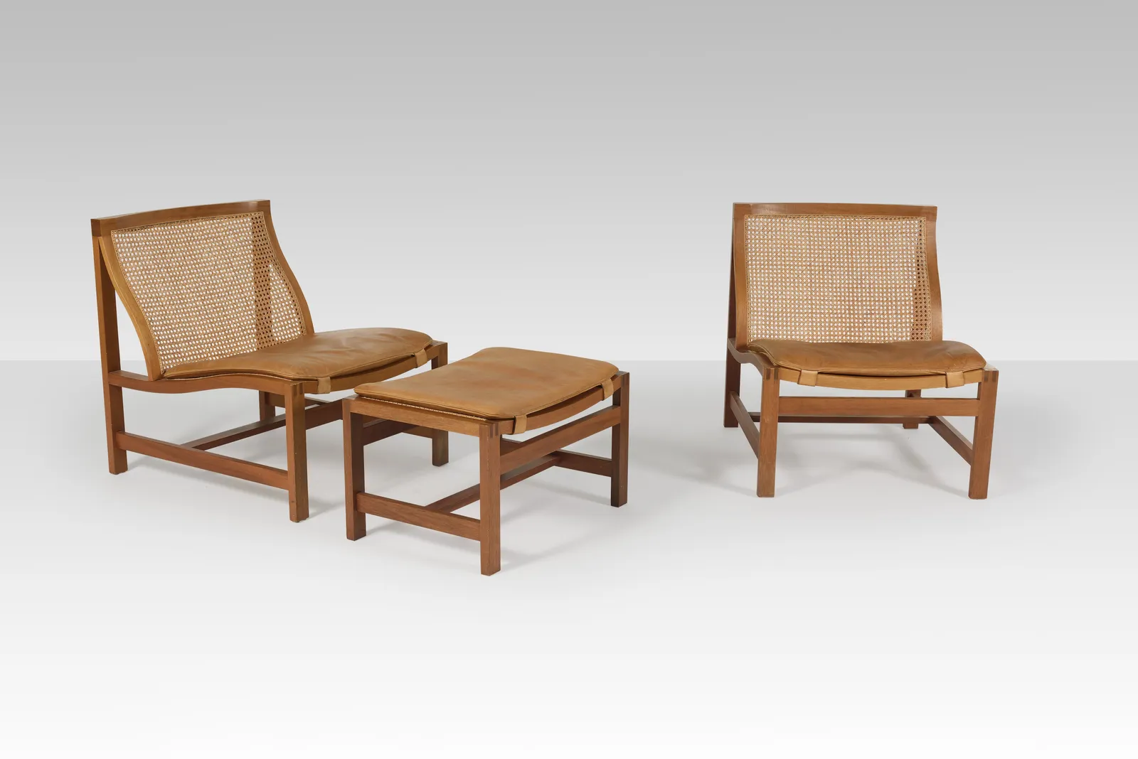 Rud Thygesen & Johnny Sørensen, Pair of lounge chairs and ottoman, 1969