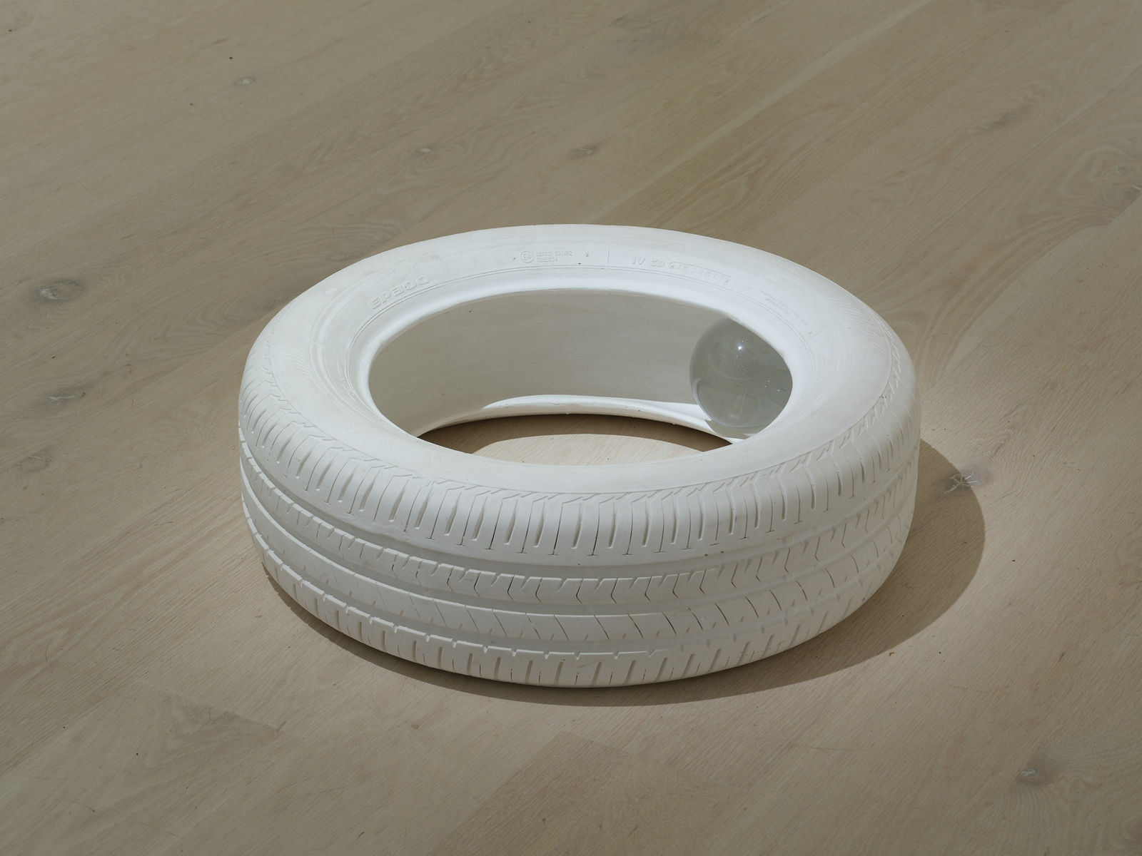 Steve Carr, A Tyre with a Glass Sphere, 2022