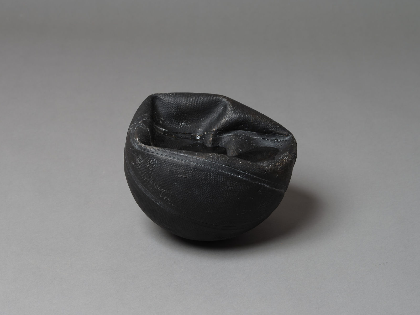 Steve Carr, A Deflated Basketball with Water, 2022