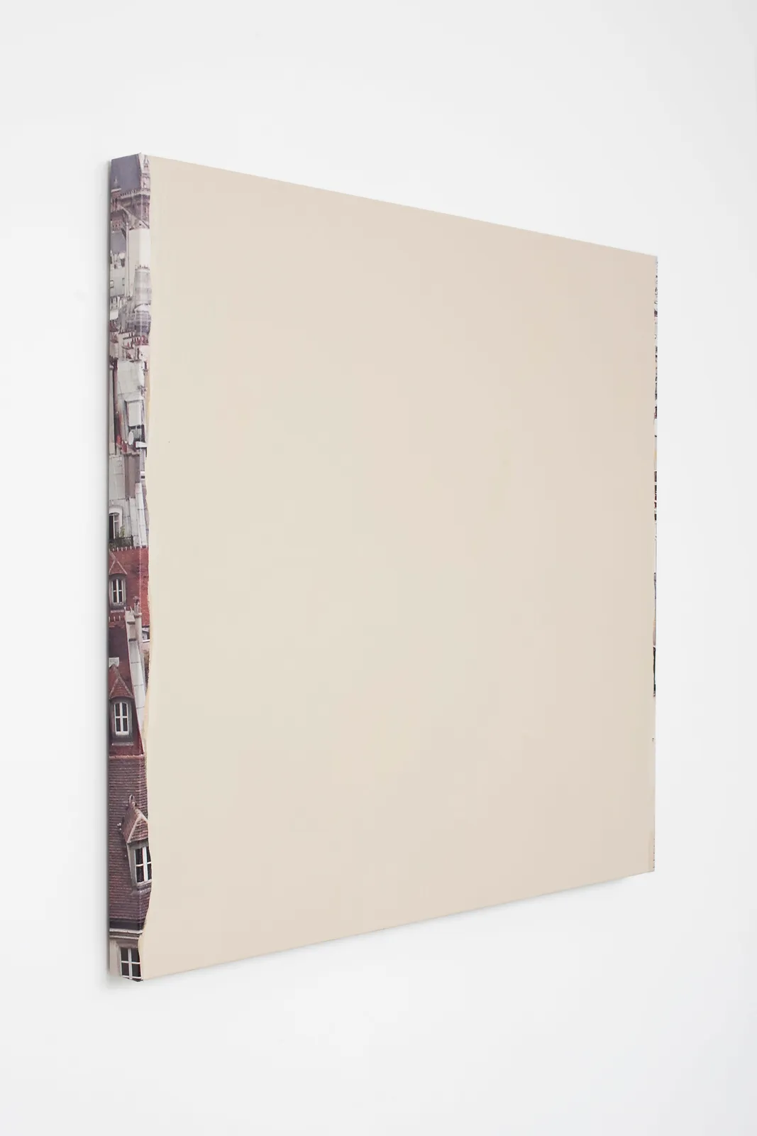 Off white acrylic paint on a canvas.