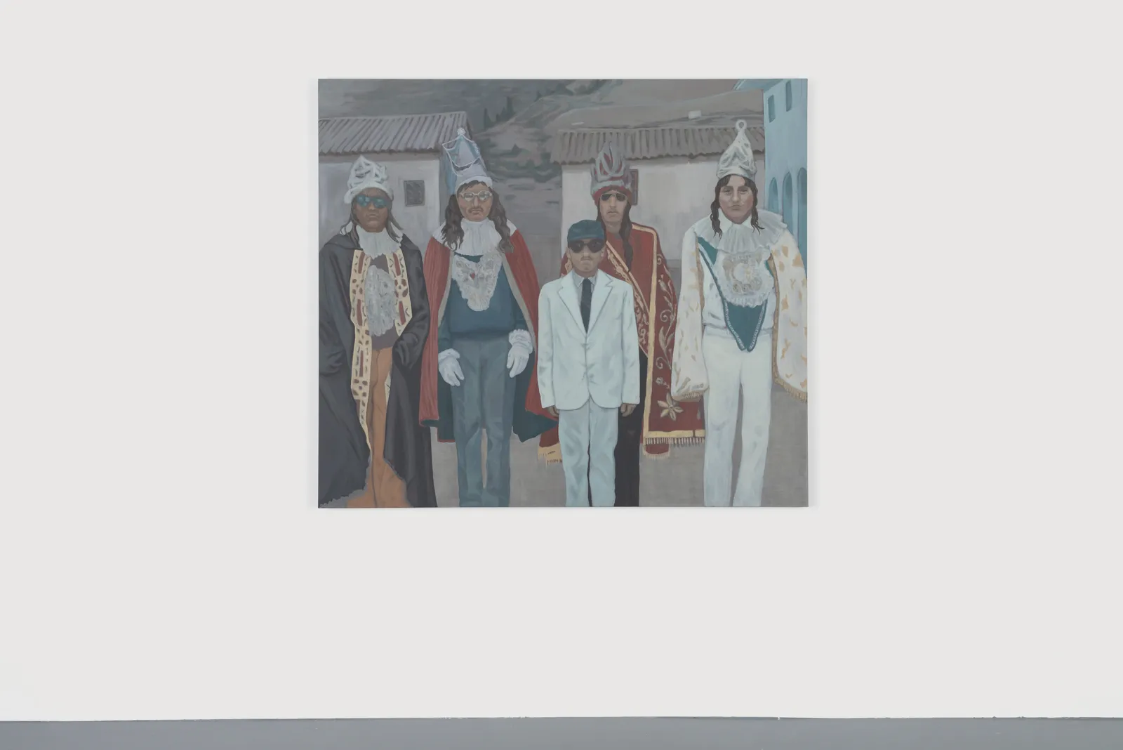 installation view of an oil painting depicting five dressed up men standing in a group