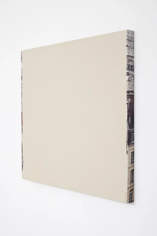 Off white acrylic paint on a canvas.