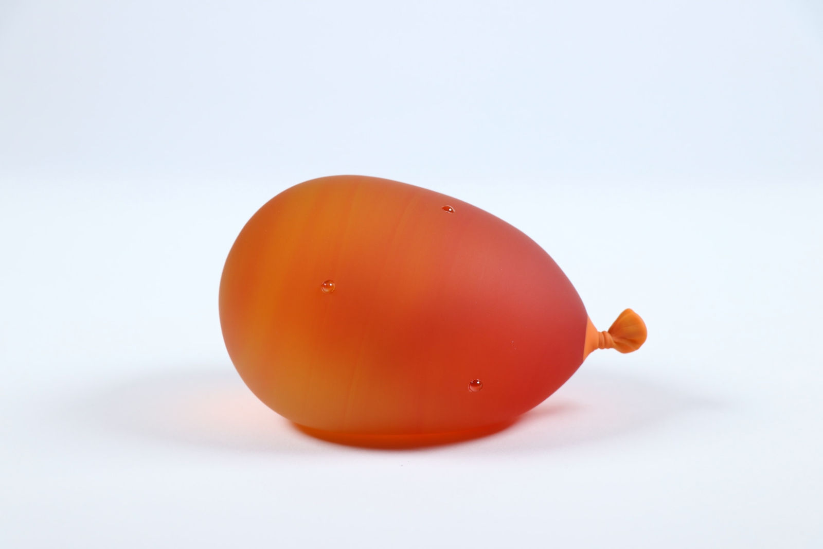 Dylan Martinez, Sunset Orange Water Balloon (droplets), 2024