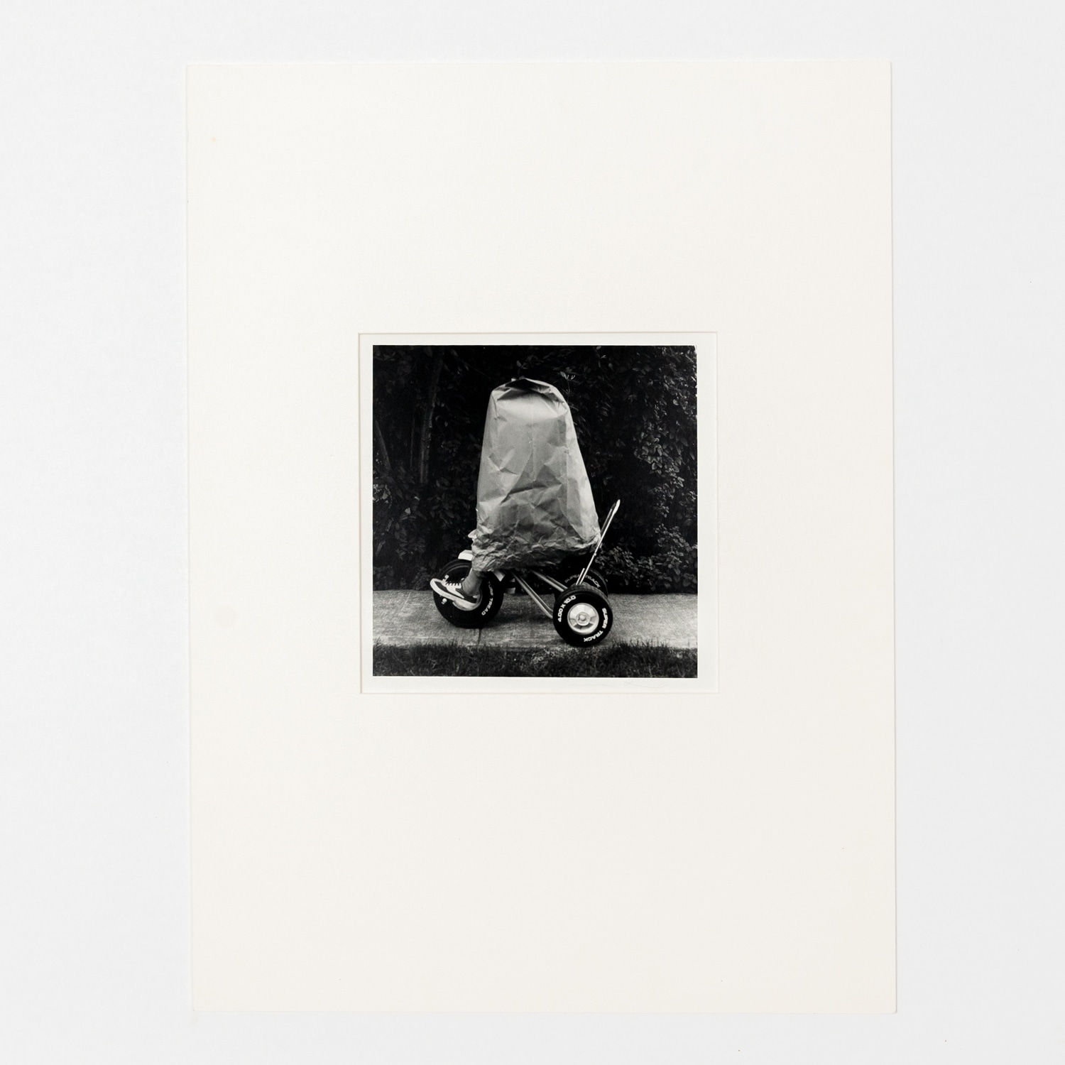 JOANNE LEONARD, Boy, Trike and Paper Bag (Noel Neri), c. 1973