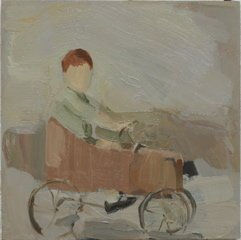 Small faceless child sits in tiny carriage and looks towards the viewer.