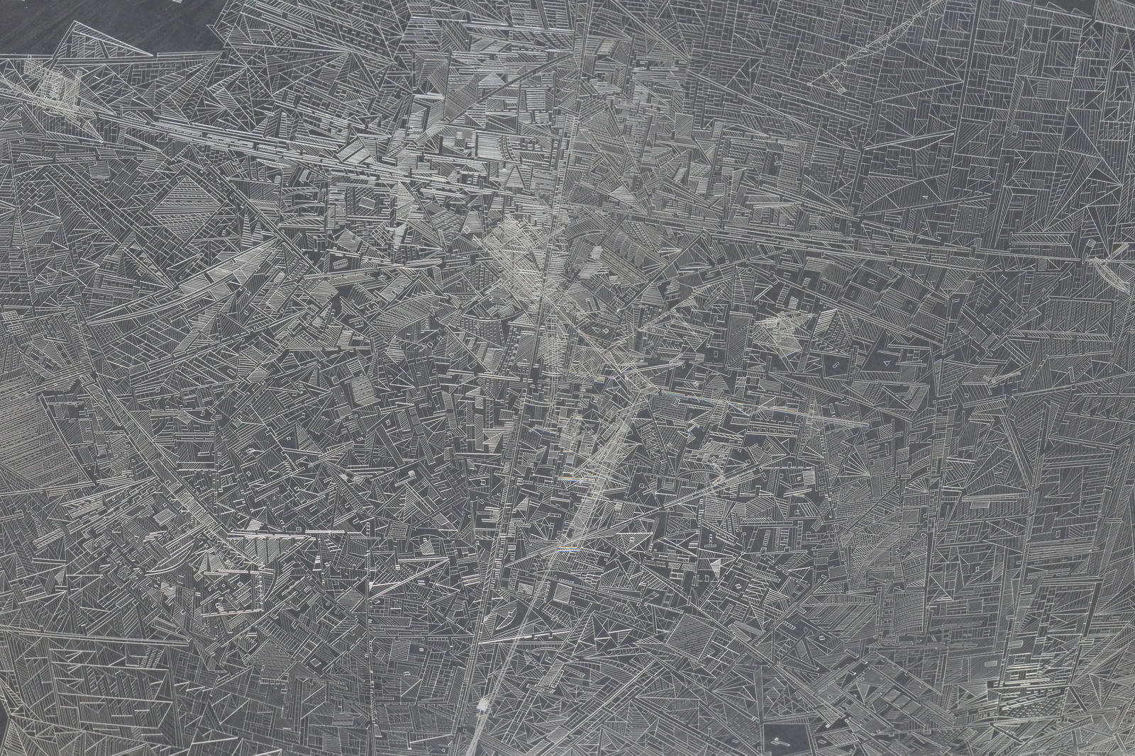 Detail; etchings on a clear convex disk.