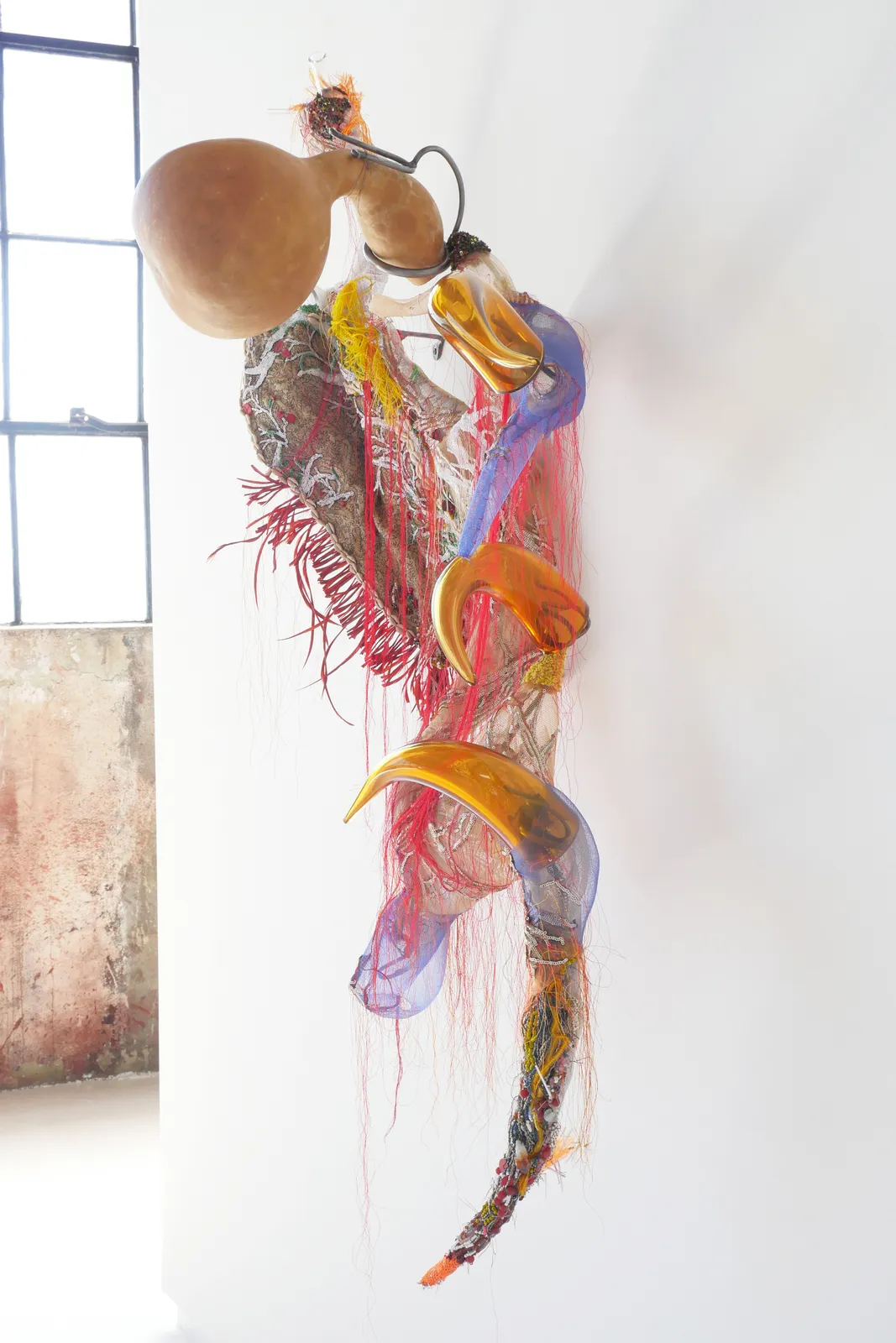 Rina Banerjee, Out of hollowness of world She punctured tight twisted curled horn, meaty teeth a wagon of emotion, 2017/2024