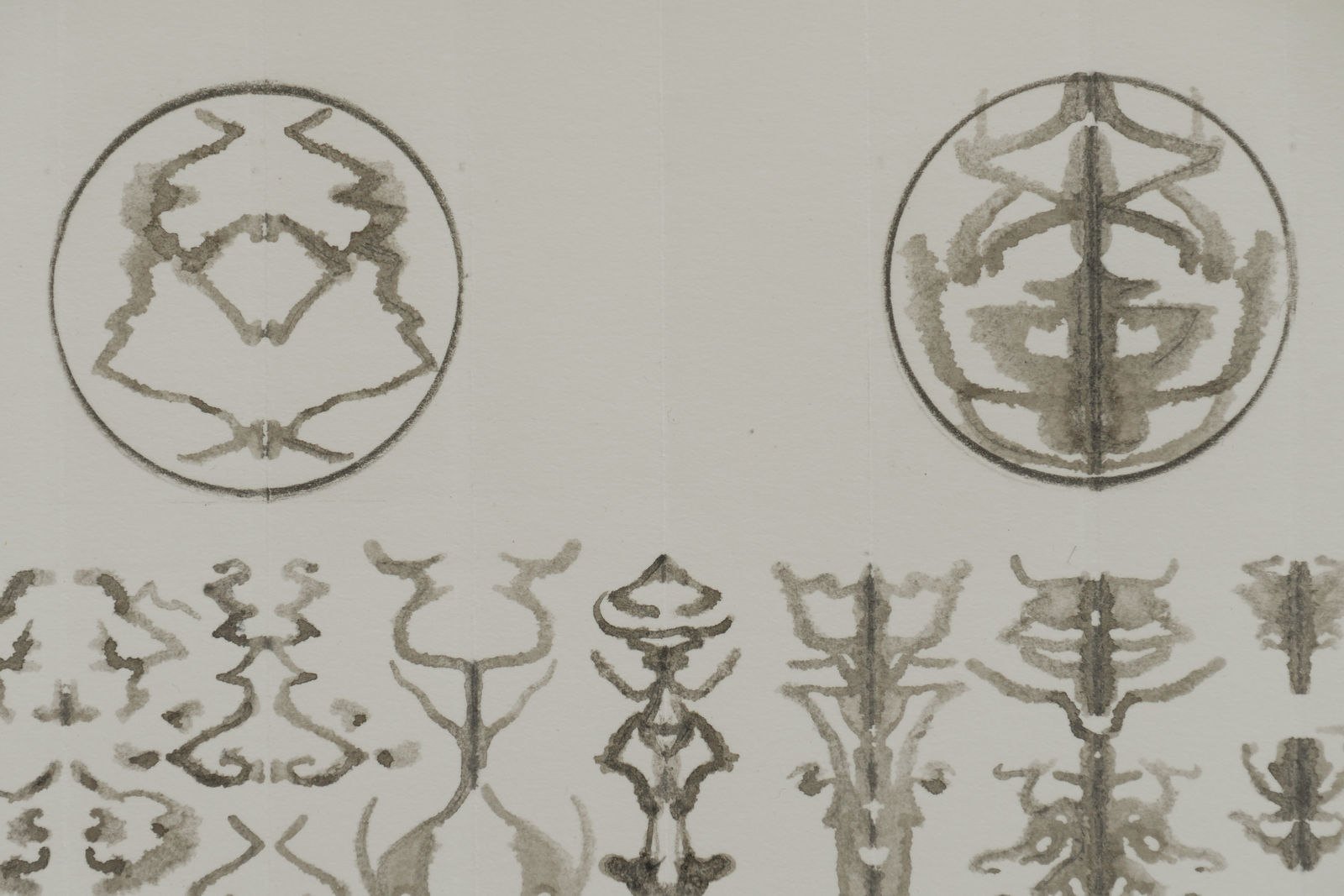 Detail of large icons at top of columns.