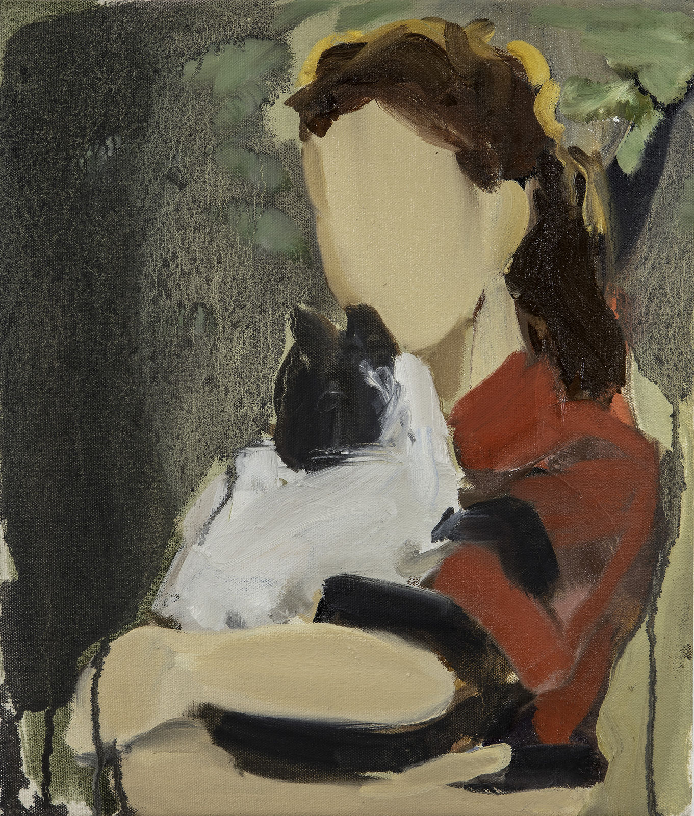 Faceless brunette girl hugs black and white cat that’s gazing towards the viewer in front of multicolored background.