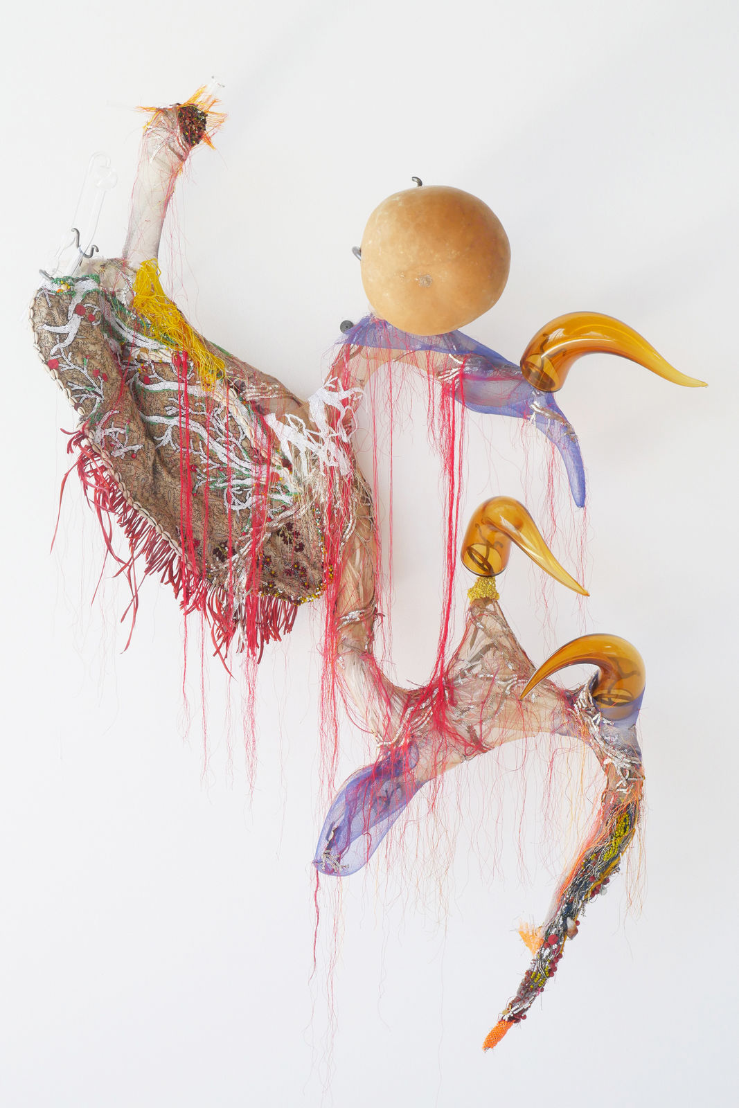 Rina Banerjee, Out of hollowness of world She punctured tight twisted curled horn, meaty teeth a wagon of emotion, 2017/2024
